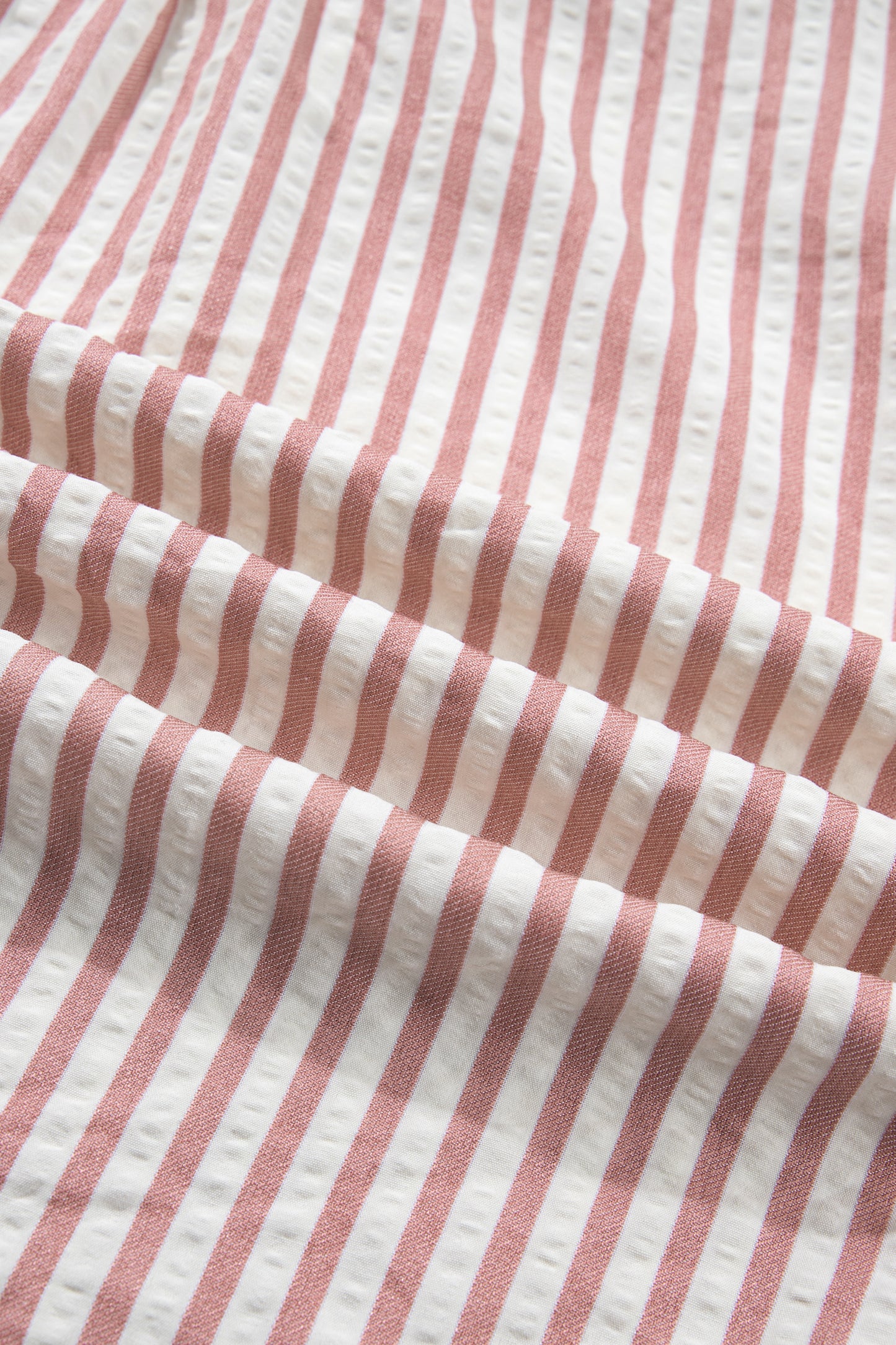 Lavendar Lane Clothing pink stripe leopard trim V-neck button-down blouse with half sleeves, stylish and lightweight for casual wear.
