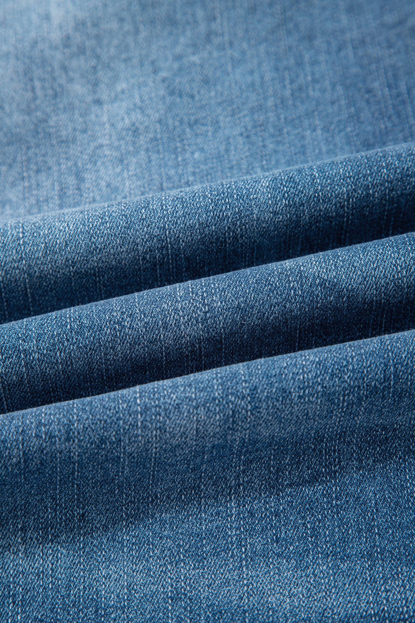 Lavendar Lane Clothing Sail Blue straight jeans with exposed stitching, classic denim bottoms, casual and stylish design.