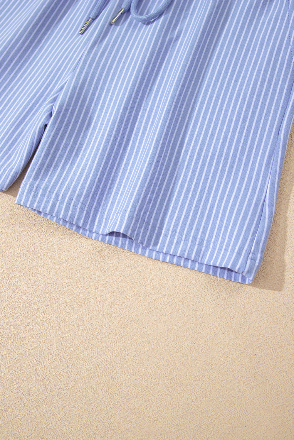 Sky blue stripe dolman sleeve polo shirt and drawstring shorts set from Lavendar Lane Clothing, casual two-piece summer outfit.