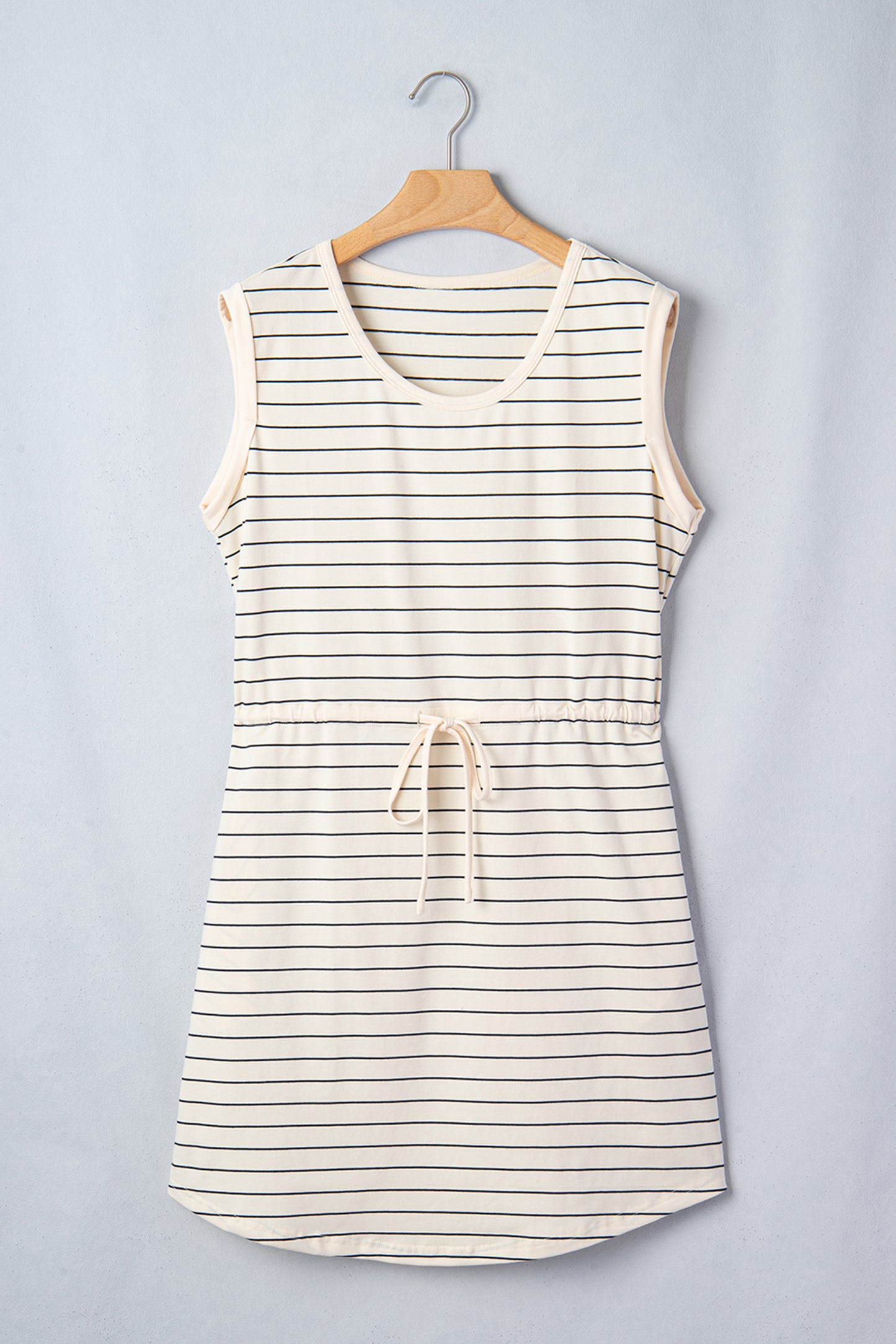 Beige stripe drawstring mini dress with pockets by Lavender Lane Clothing, casual tunic tank dress with a relaxed fit and stylish design.