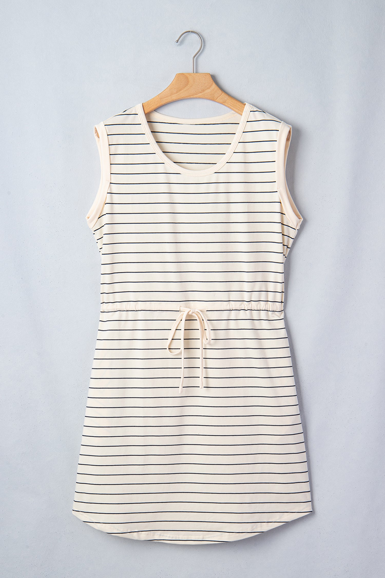 Beige stripe drawstring mini dress with pockets by Lavender Lane Clothing, casual tunic tank dress with a relaxed fit and stylish design.