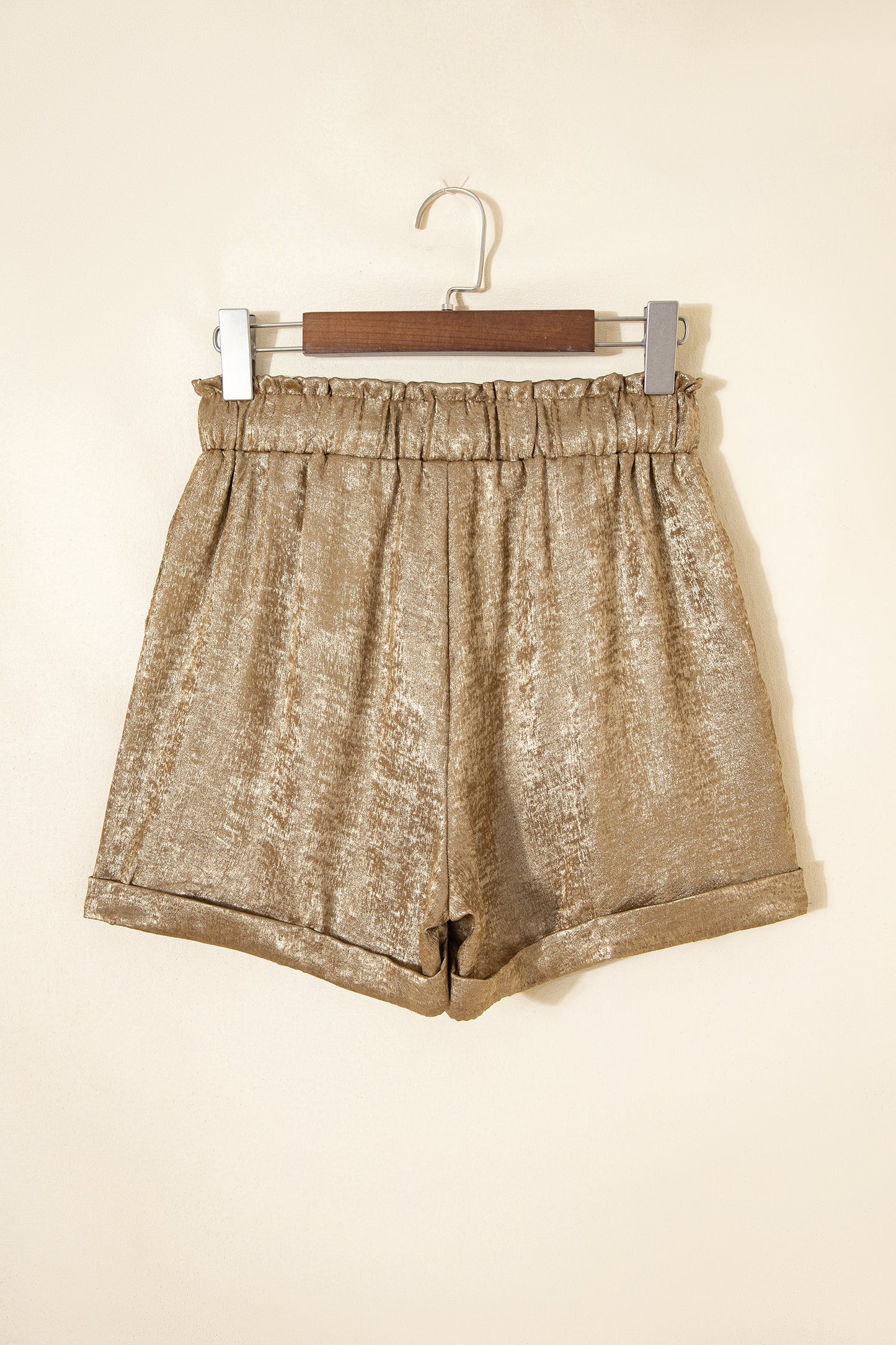 Gold metallic luster tie elastic waist casual shorts with cuffed hems from Lavendar Lane Clothing, perfect for stylish summer wear.