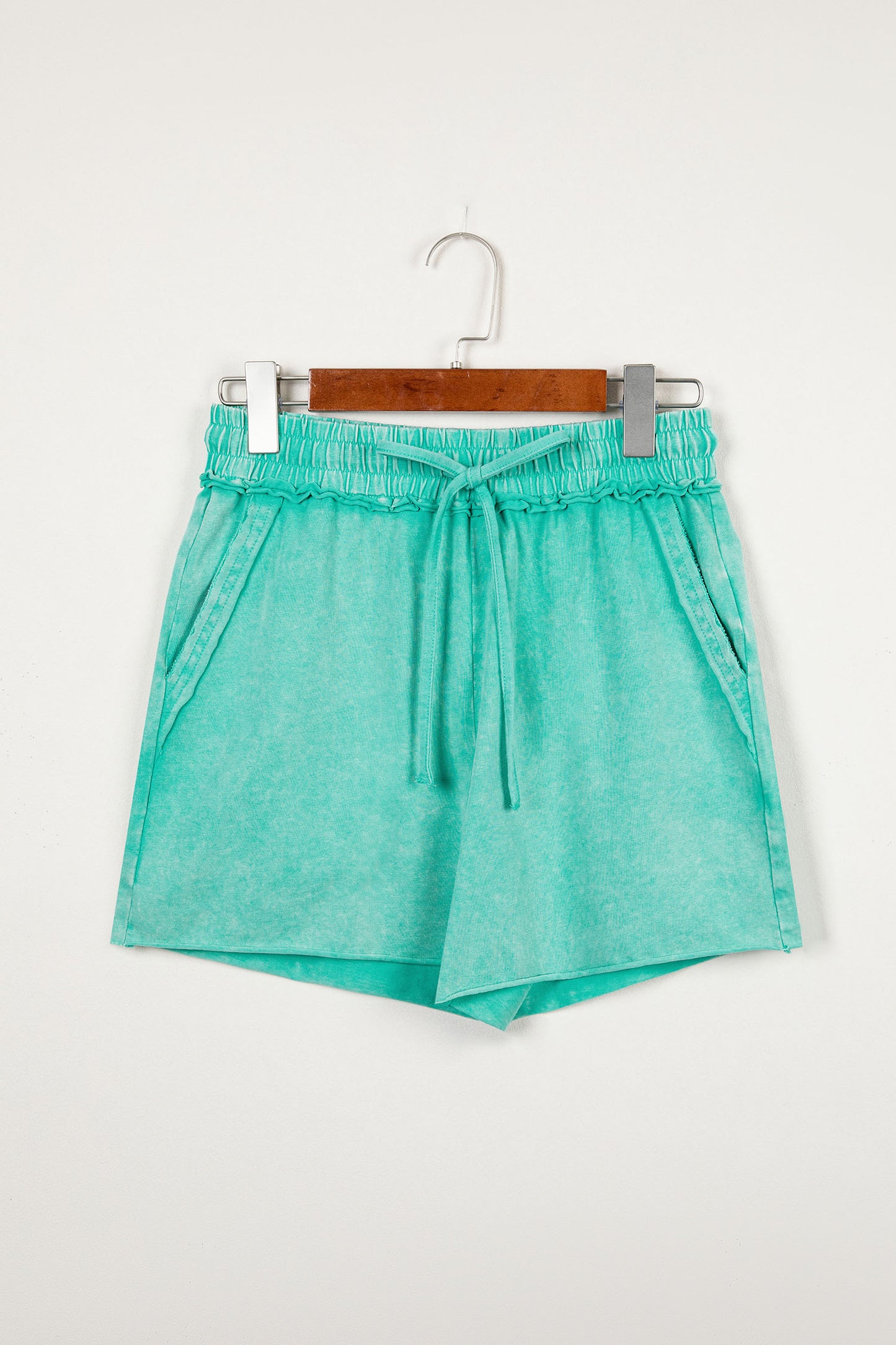 Sea green mineral washed casual shorts with drawstring waist and raw cut hem by Lavendar Lane Clothing