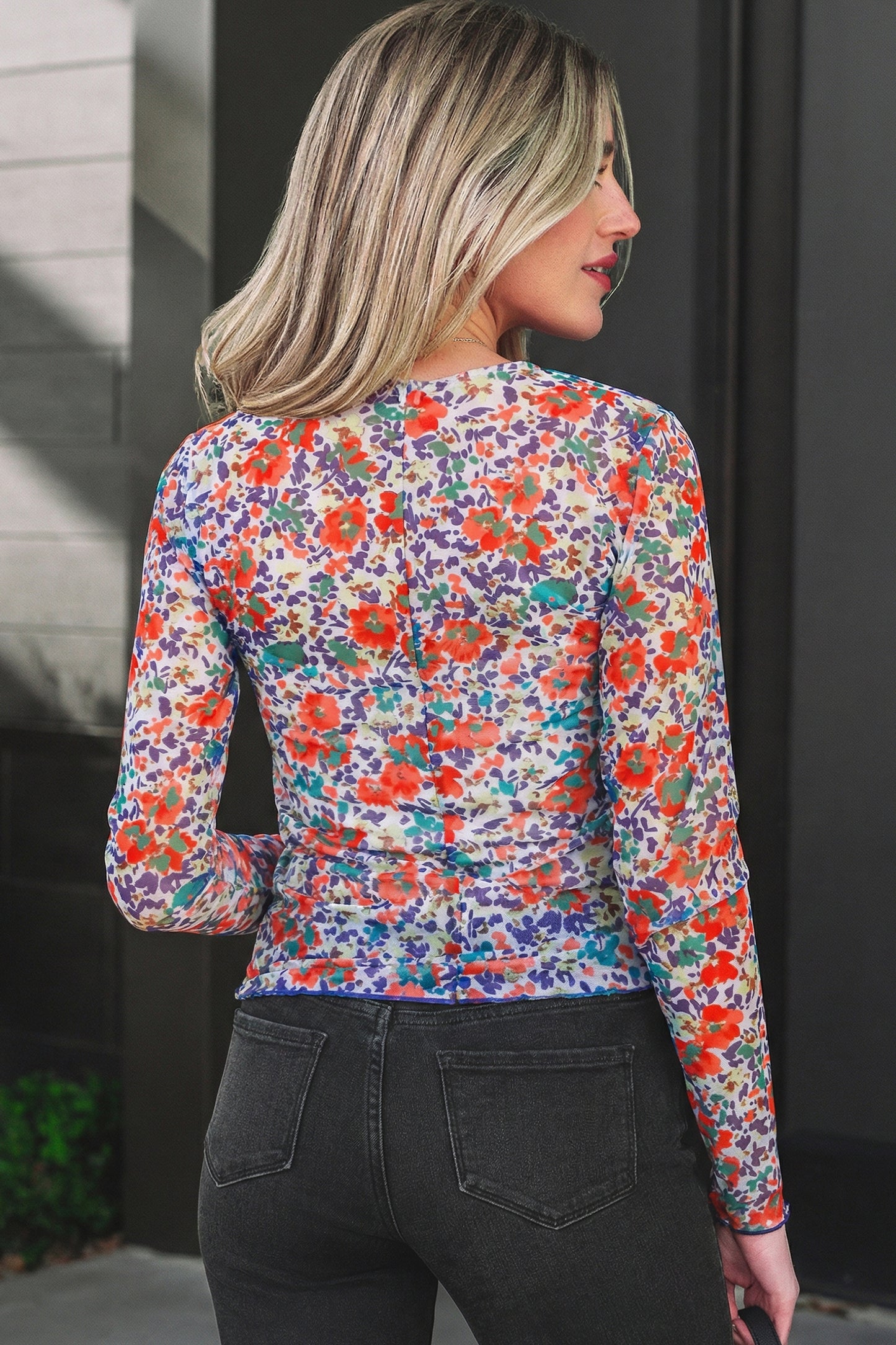 Blue slim fit floral mesh long sleeve mock neck top by Lavender Lane Clothing, featuring a stylish design and lightweight fabric.