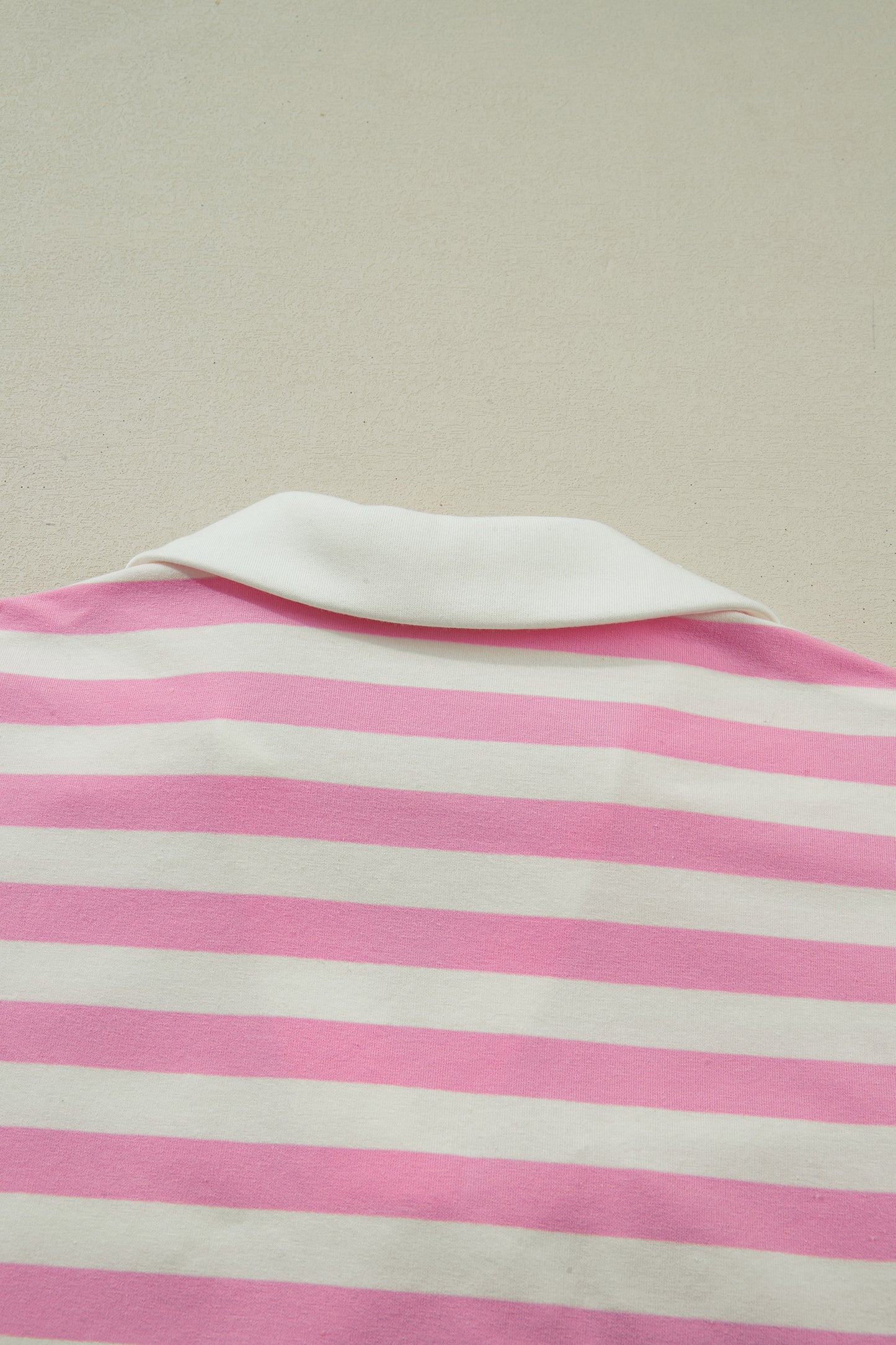 Pink stripe collar V neck ruffled short sleeve blouse from Lavendar Lane Clothing, featuring a stylish and feminine design.