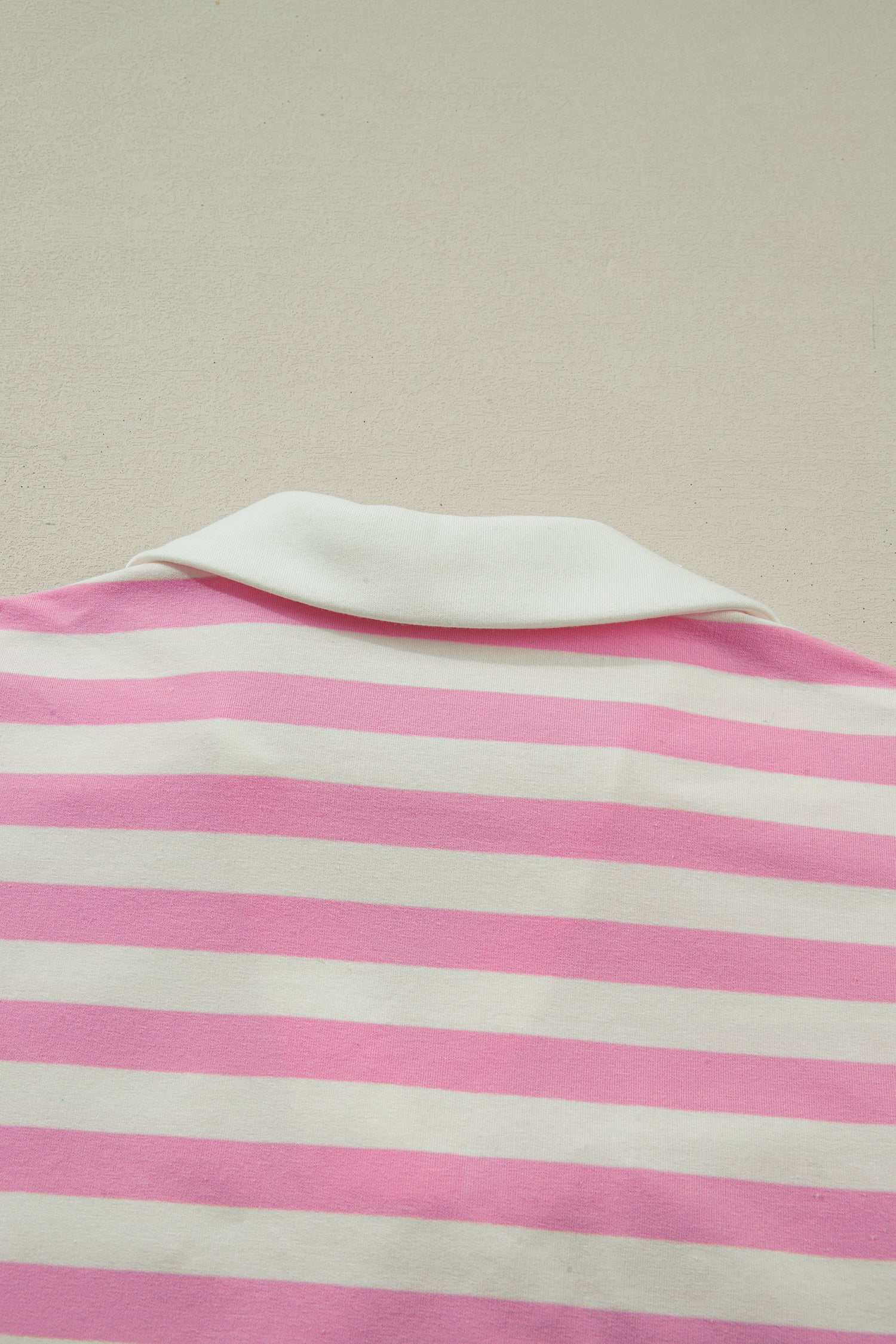 Pink stripe collar V neck ruffled short sleeve blouse from Lavendar Lane Clothing, featuring a stylish and feminine design.