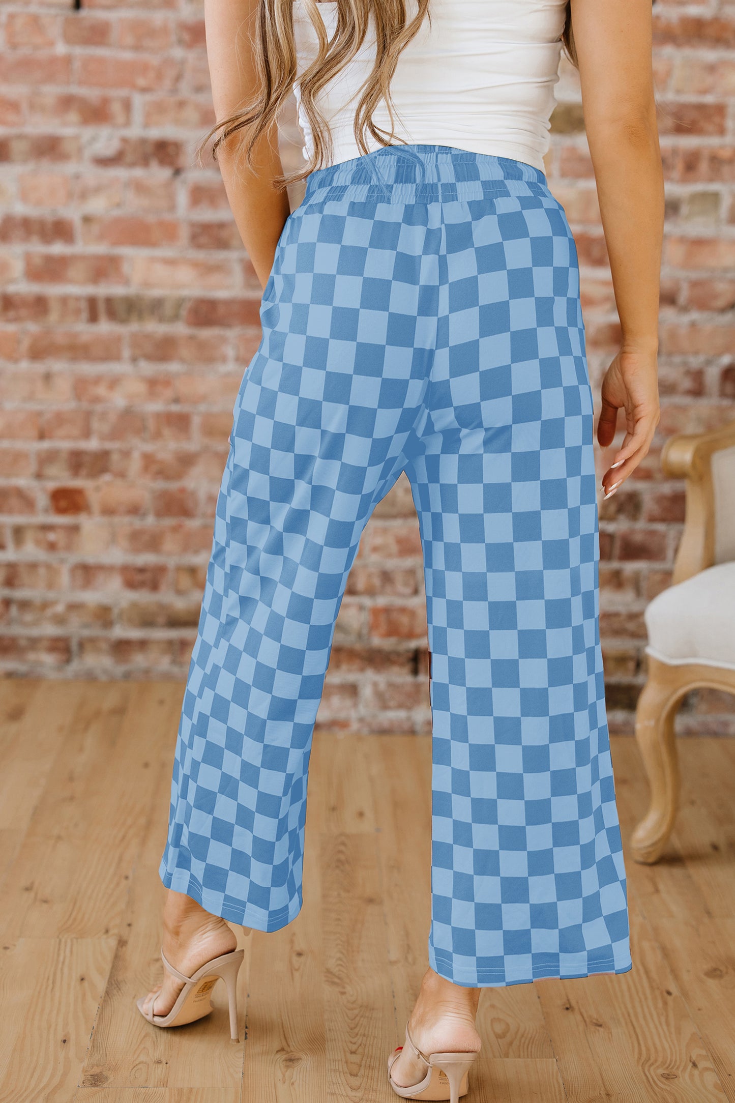 Sky blue checkered elastic high waist casual pants from Lavendar Lane Clothing, loose fit with stylish design.