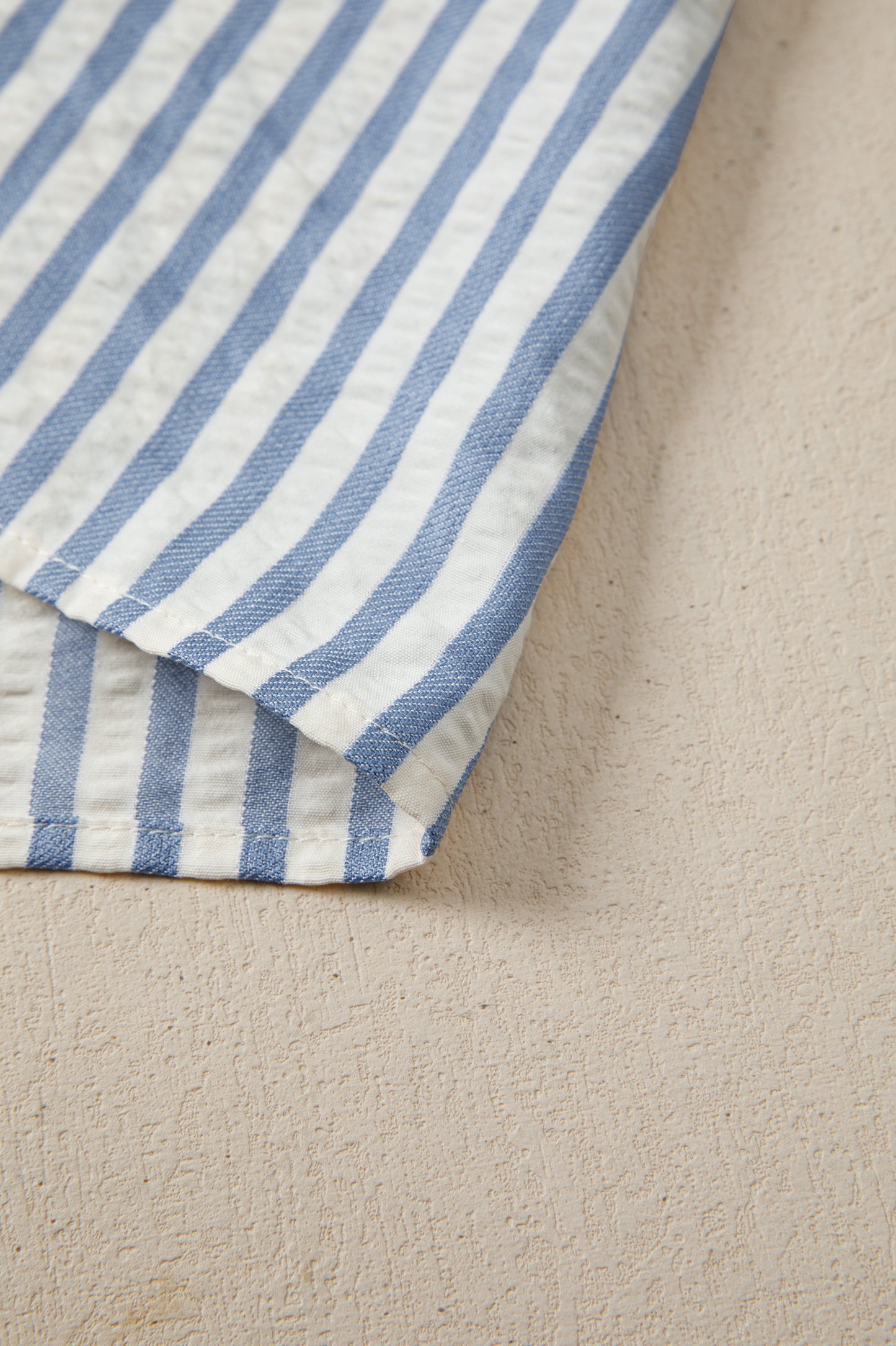 Sky blue stripe leopard trim V-neck button-down blouse by Lavendar Lane Clothing, featuring half sleeves and stylish design.