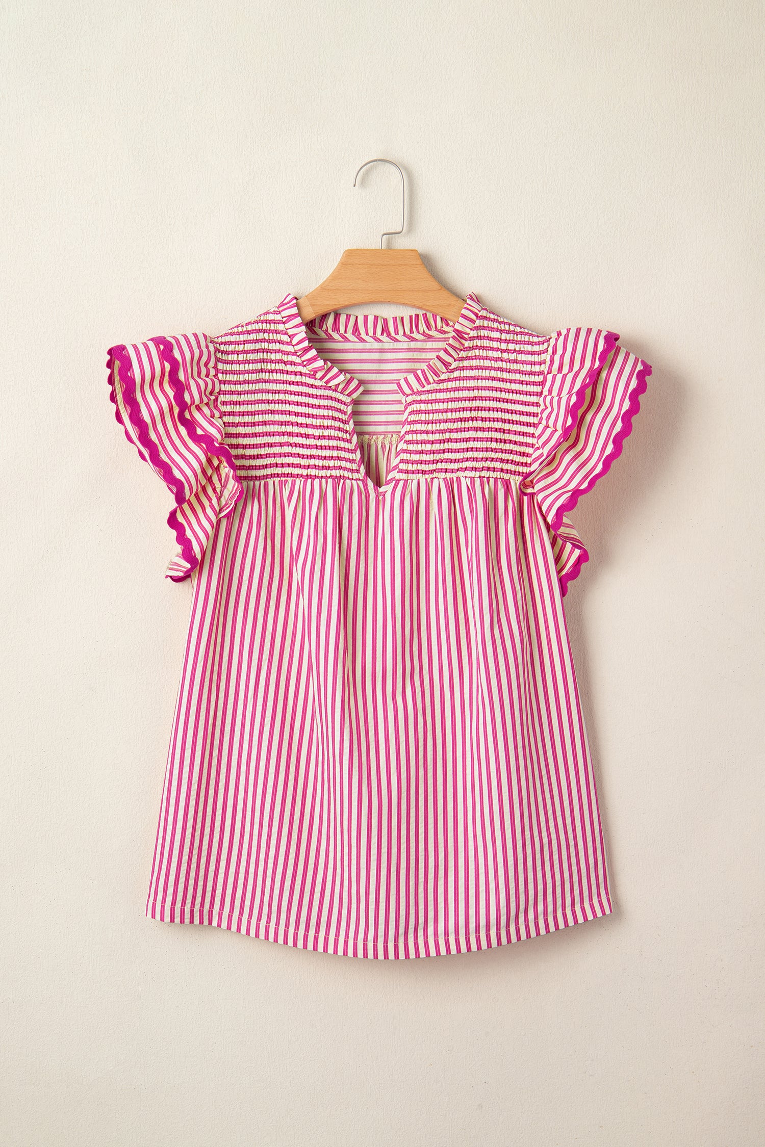 Lavendar Lane Clothing rose stripe short sleeve blouse with shirred yoke and ruffled details, perfect for a feminine, casual look.