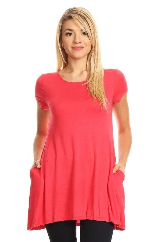 Knit tunic top in a relaxed fit with a round nec