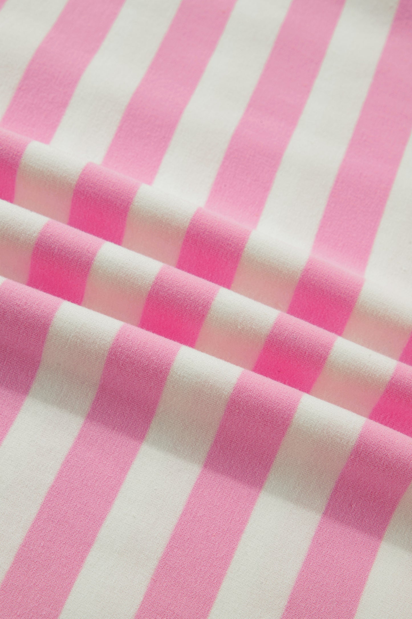 Pink stripe collar V-neck ruffled short sleeve blouse by Lavender Lane Clothing, featuring a feminine design and lightweight fabric.
