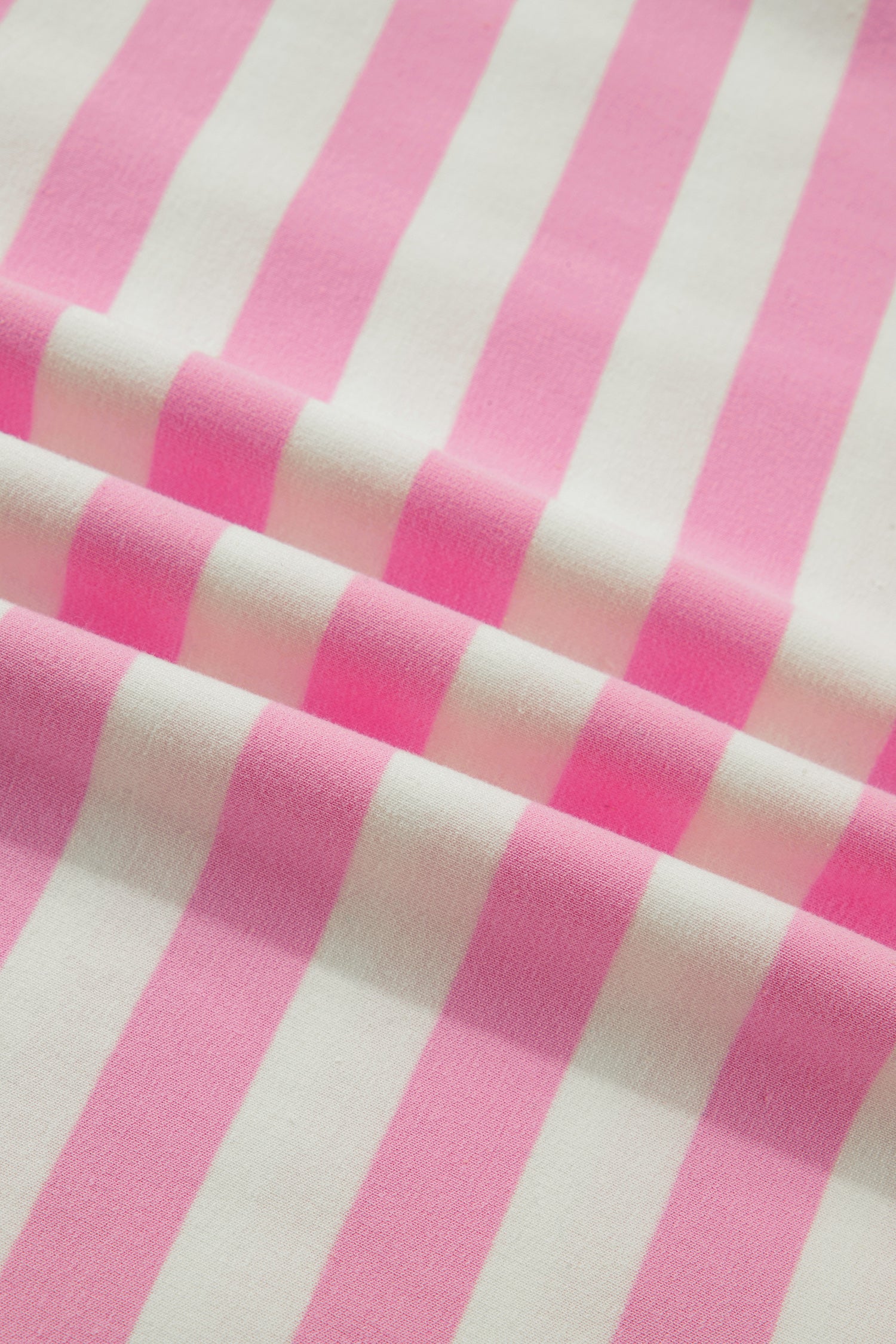 Pink stripe collar V-neck ruffled short sleeve blouse by Lavender Lane Clothing, featuring a feminine design and lightweight fabric.