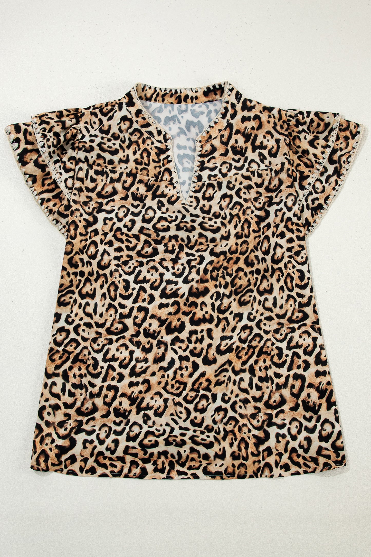 Lavendar Lane plus size khaki blouse with leopard print, ruffled short sleeves, stitch detail, and stylish design.