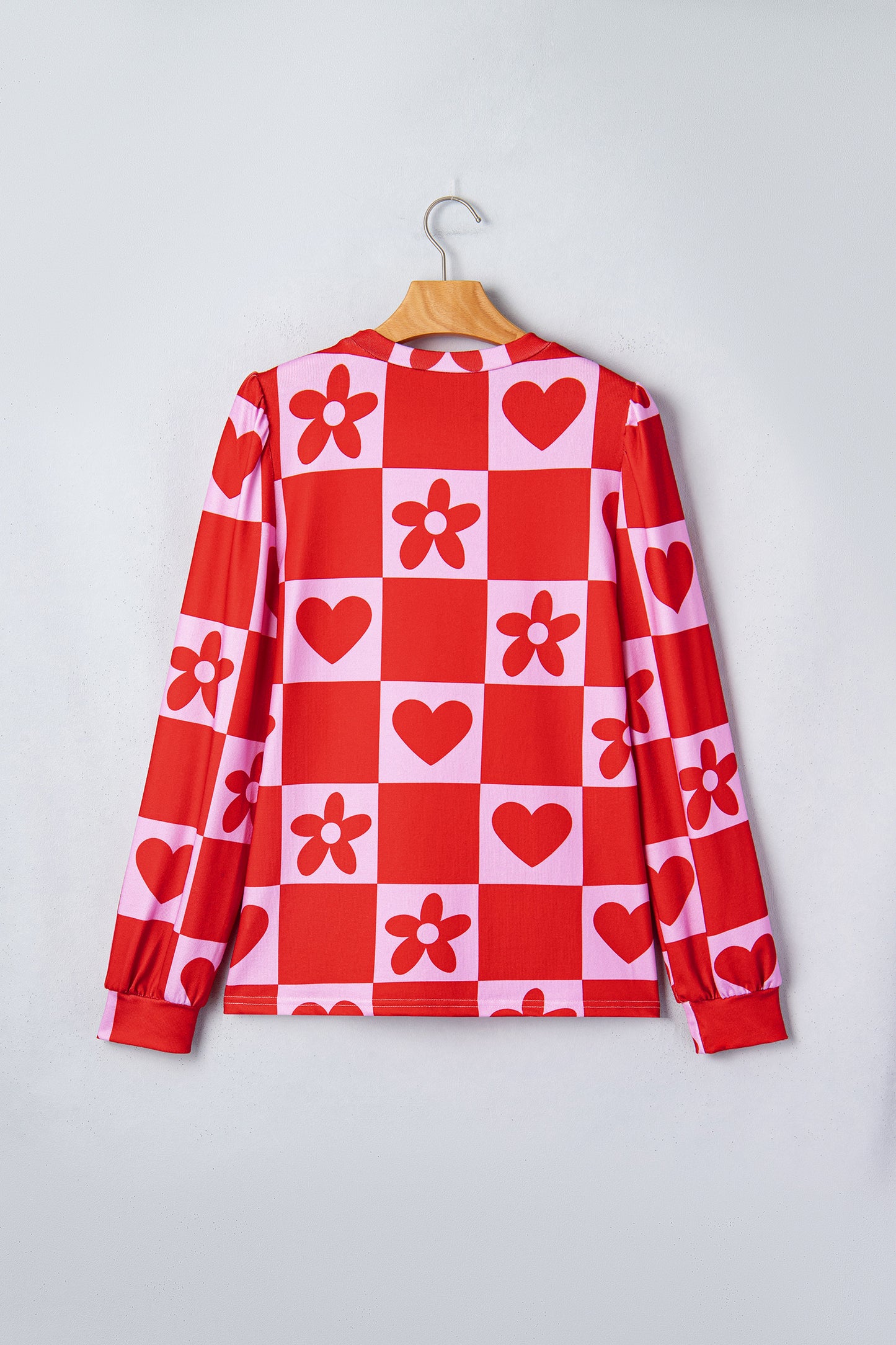 Red dotted heart festive blouse by Lavendar Lane Clothing, featuring a stylish design perfect for Valentine's Day celebrations.