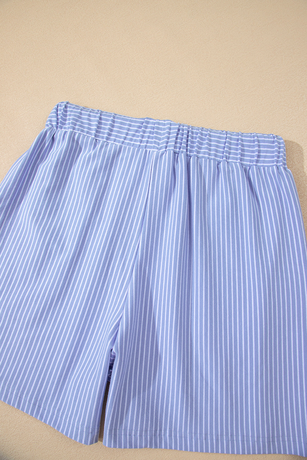 Sky blue stripe dolman sleeve polo shirt and drawstring shorts set by Lavender Lane Clothing, casual two-piece summer outfit.