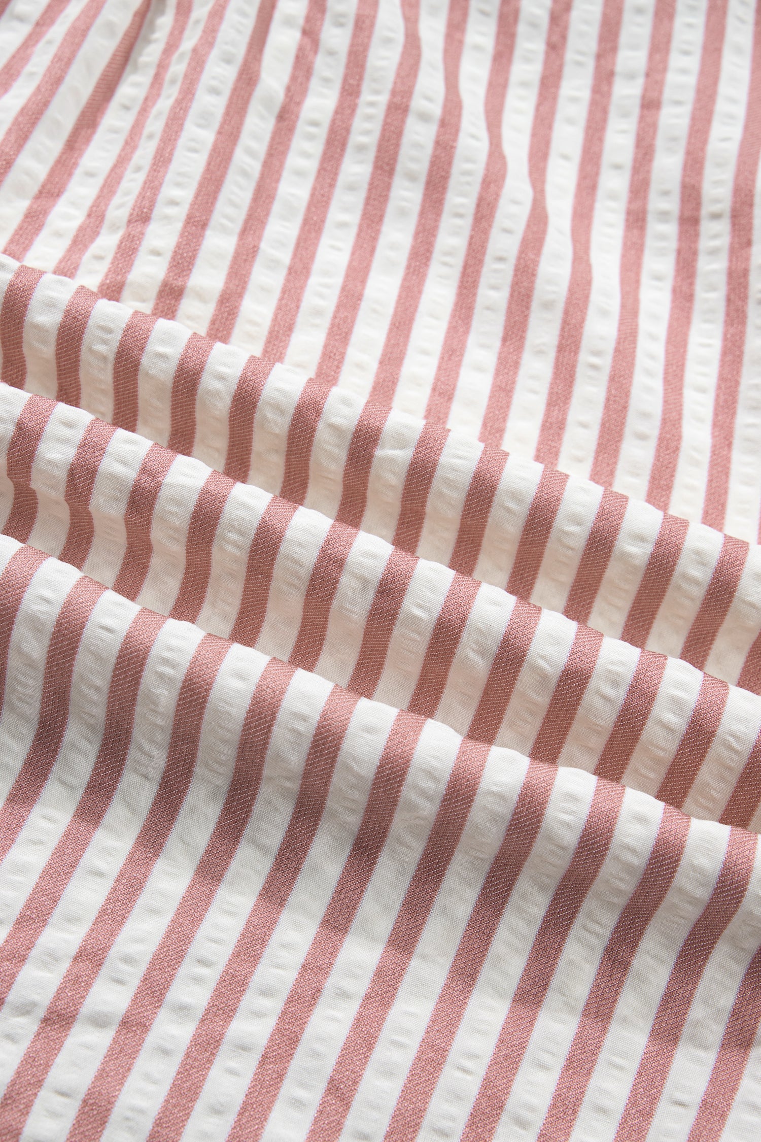 Lavendar Lane Clothing pink stripe leopard trim V-neck button-down blouse with half sleeves, stylish and lightweight for casual wear.