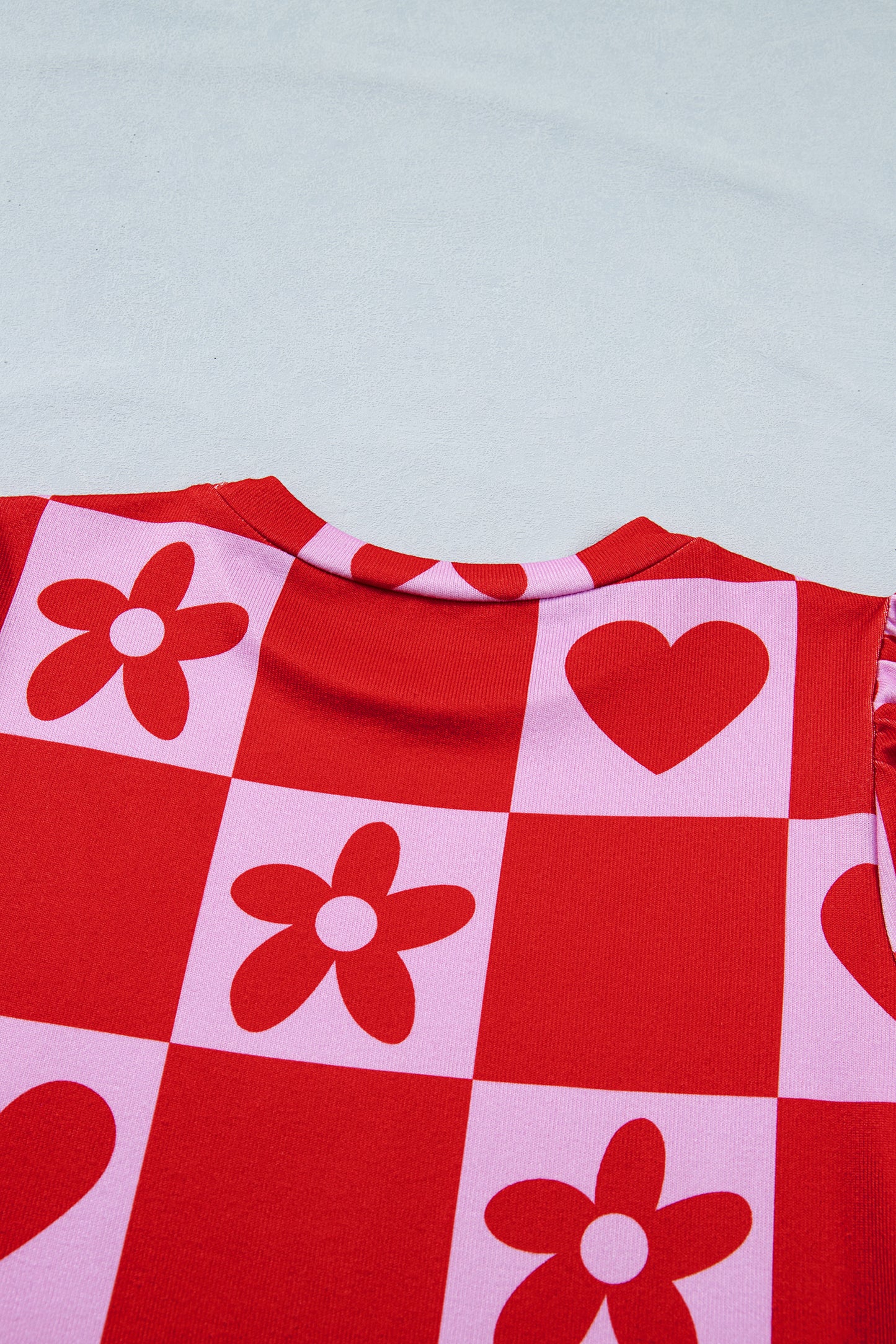 Red dotted heart festive blouse by Lavendar Lane Clothing, featuring a stylish design perfect for Valentine's Day.