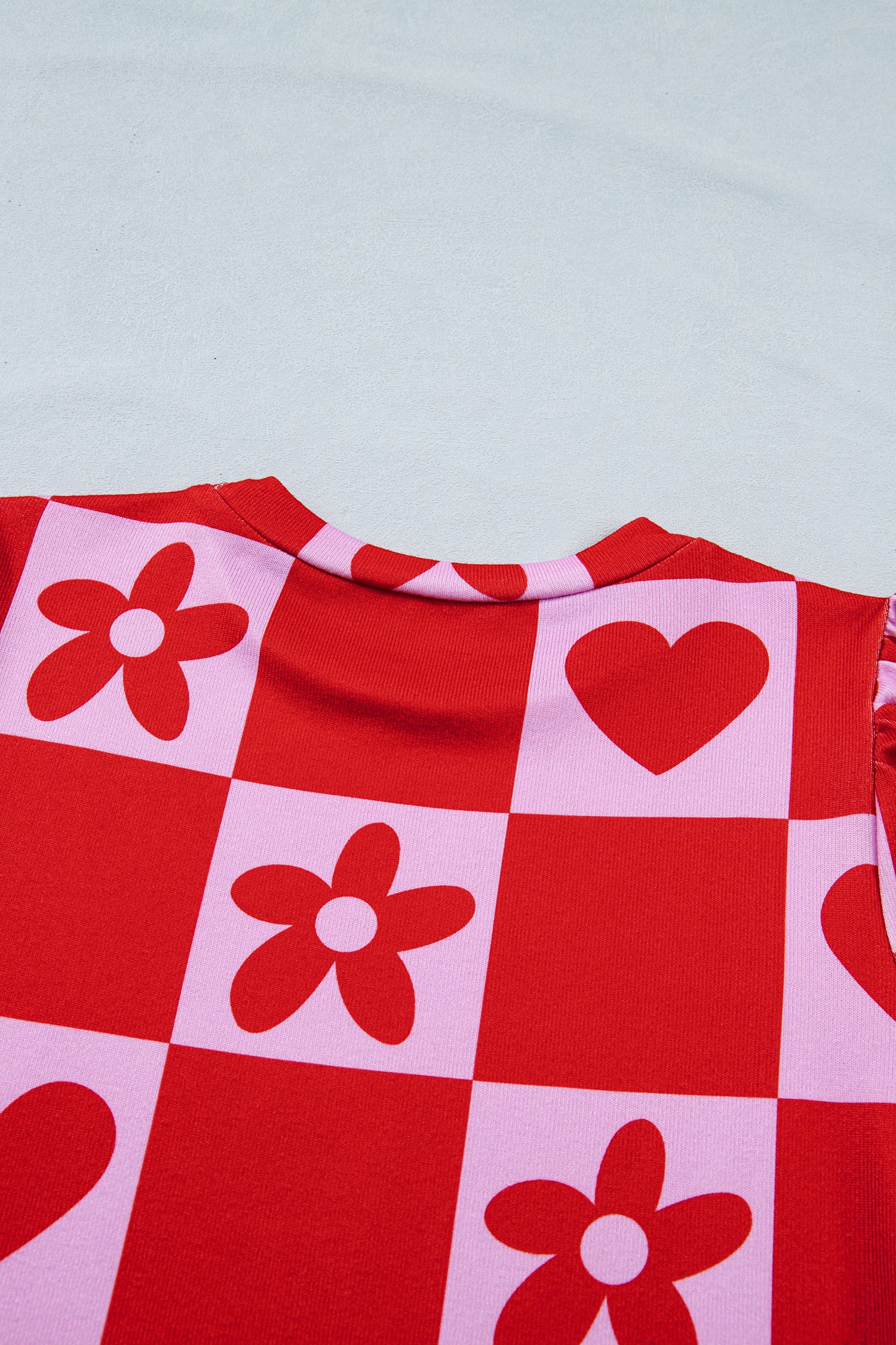 Red dotted heart festive blouse by Lavendar Lane Clothing, featuring a stylish design perfect for Valentine's Day.