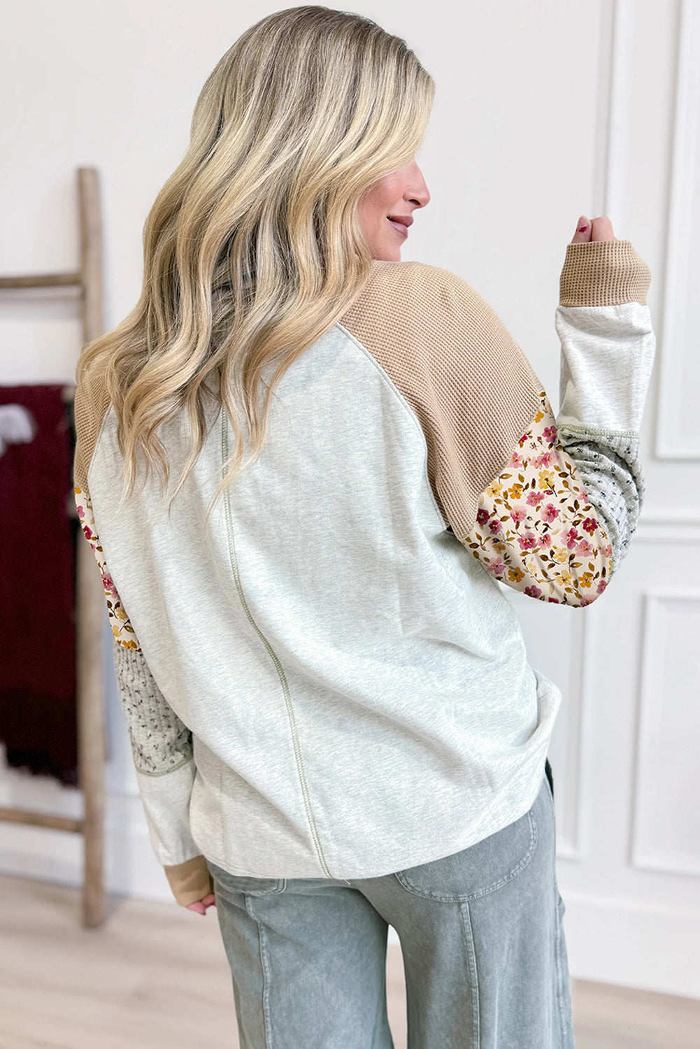 Light grey mixed print raglan sleeve blouse with patchwork and exposed seams from Lavender Lane Clothing.