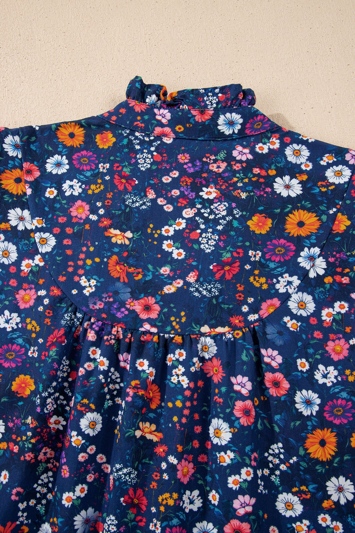Blue Wild Daisy floral split neck mini dress with short puff sleeves by Lavendar Lane Clothing, perfect for spring and summer wear.