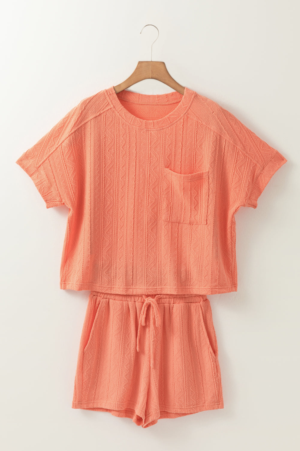 Pale chestnut textured short sleeve top with patch pocket and drawstring shorts set from Lavender Lane Clothing, casual summer style.