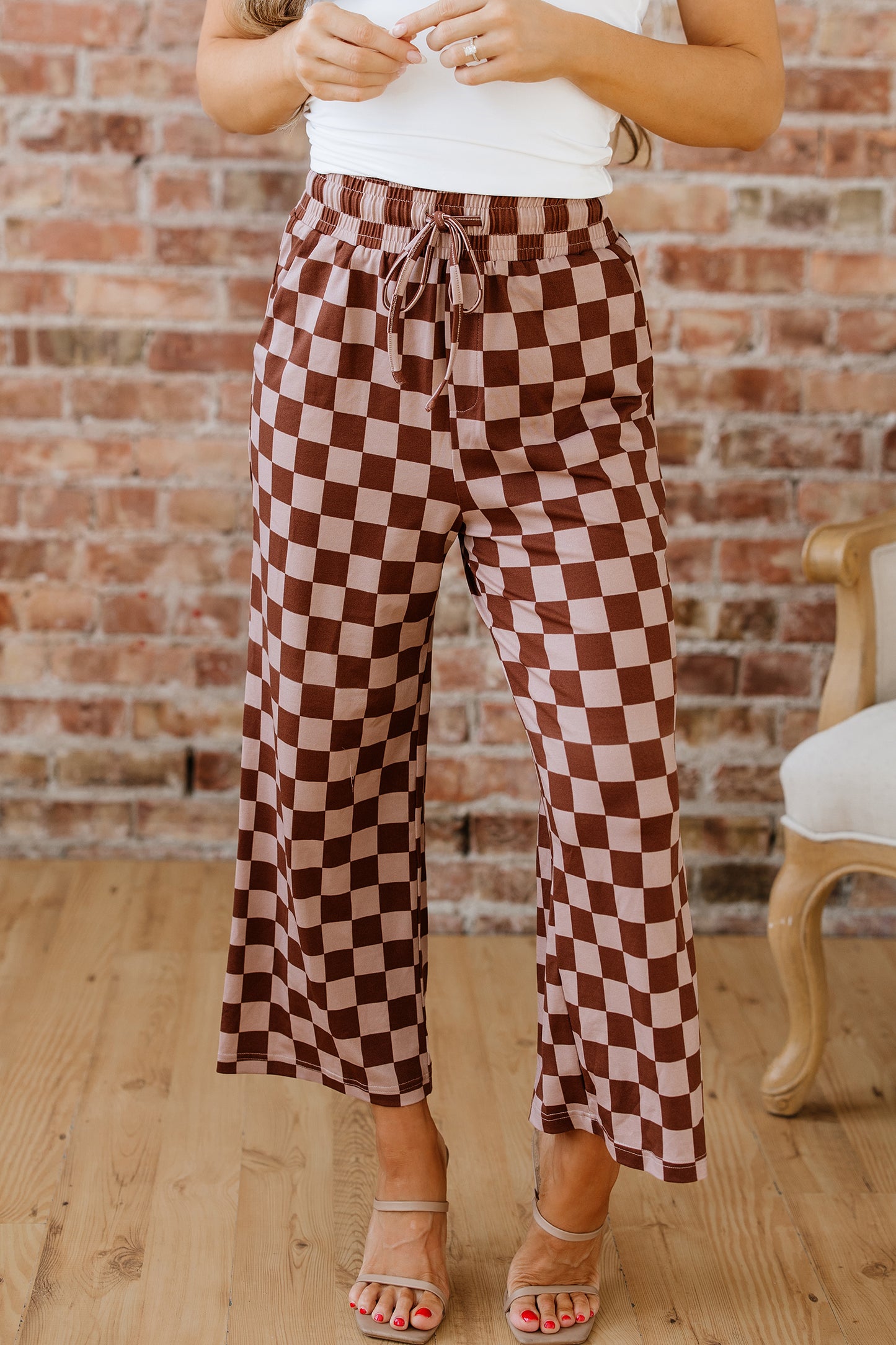 Khaki checkered elastic high waist loose casual pants from Lavendar Lane Clothing, showing relaxed fit and stylish pattern.