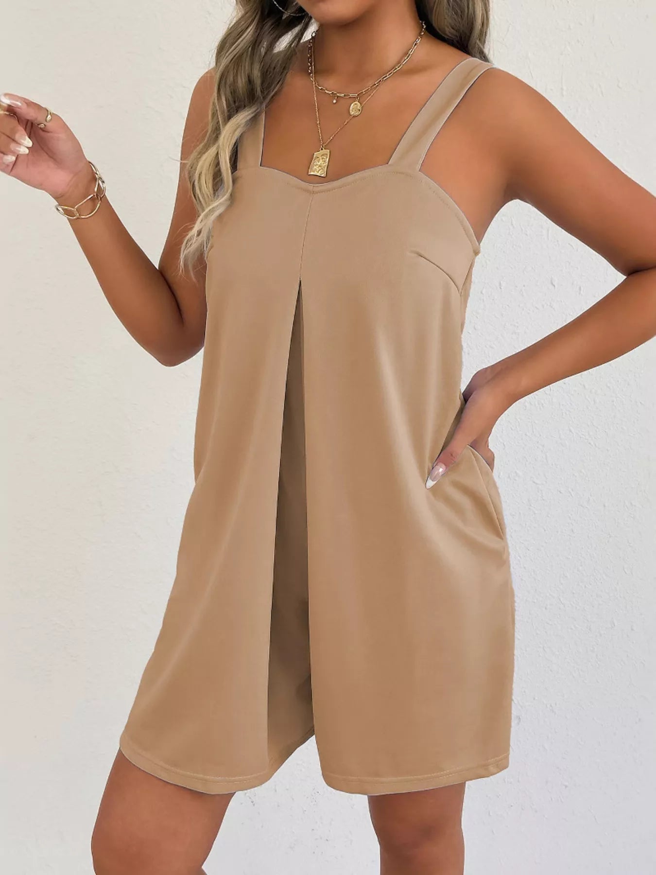 Lavendar Lane Clothing sleeveless casual romper with side pockets, lightweight fabric, and relaxed fit for warm weather.