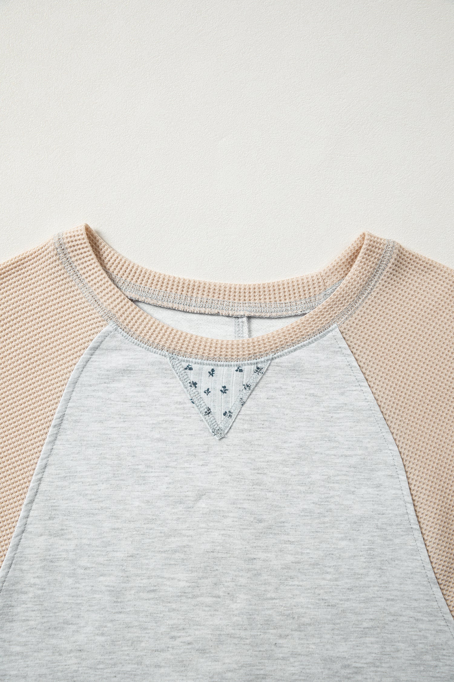 Light grey mixed print raglan sleeve blouse with patchwork and exposed seams by Lavender Lane Clothing
