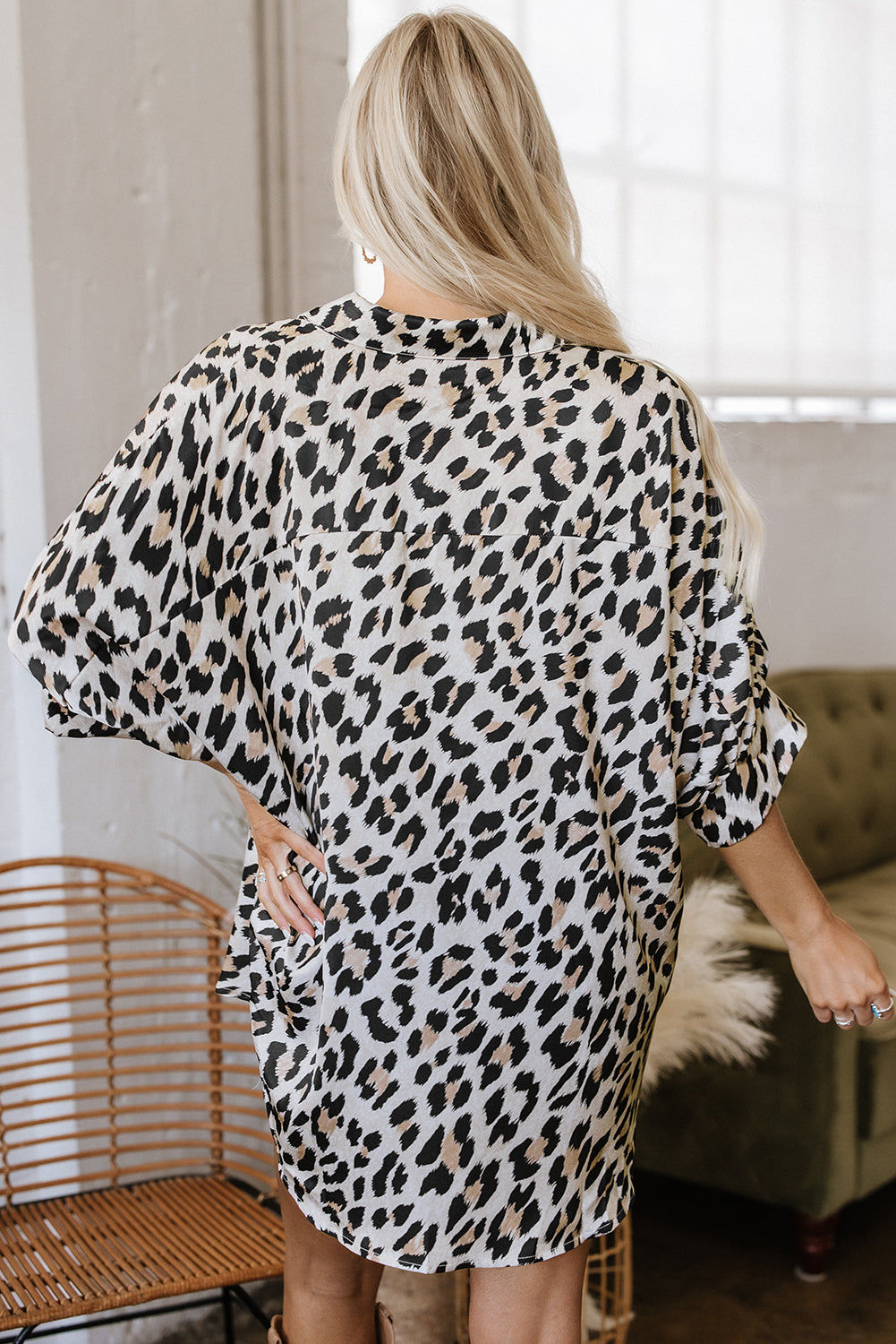 Beige leopard print buttoned shirt top with 3/4 sleeves and loose fit by Lavendar Lane Clothing.