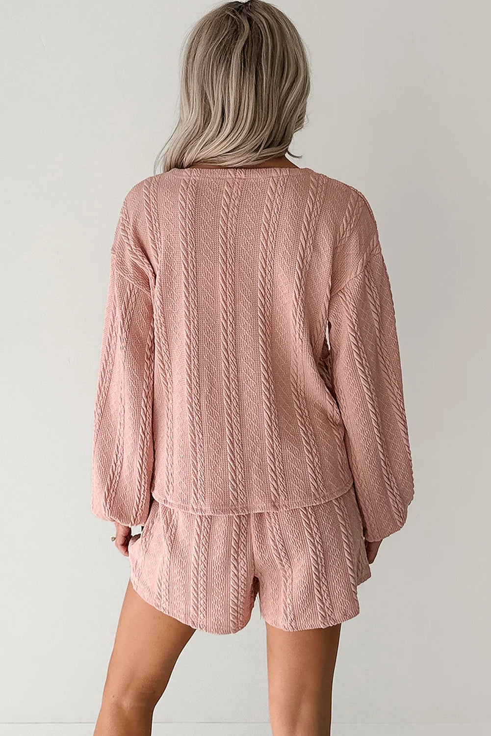 Lavendar Lane Pink cable knit V-neck cardigan and shorts two-piece set, cozy and stylish for casual wear.