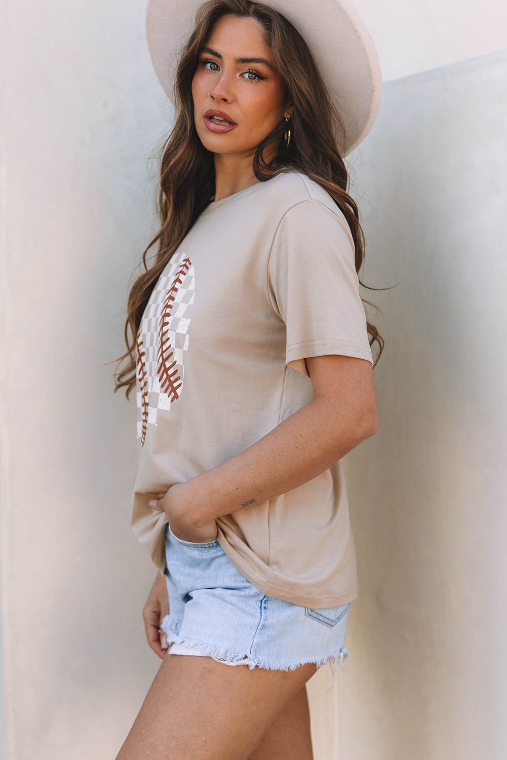 Lavendar Lane Clothing Jet Stream Checkered Baseball Graphic Tee featuring a bold checkered pattern and baseball-themed graphic design.