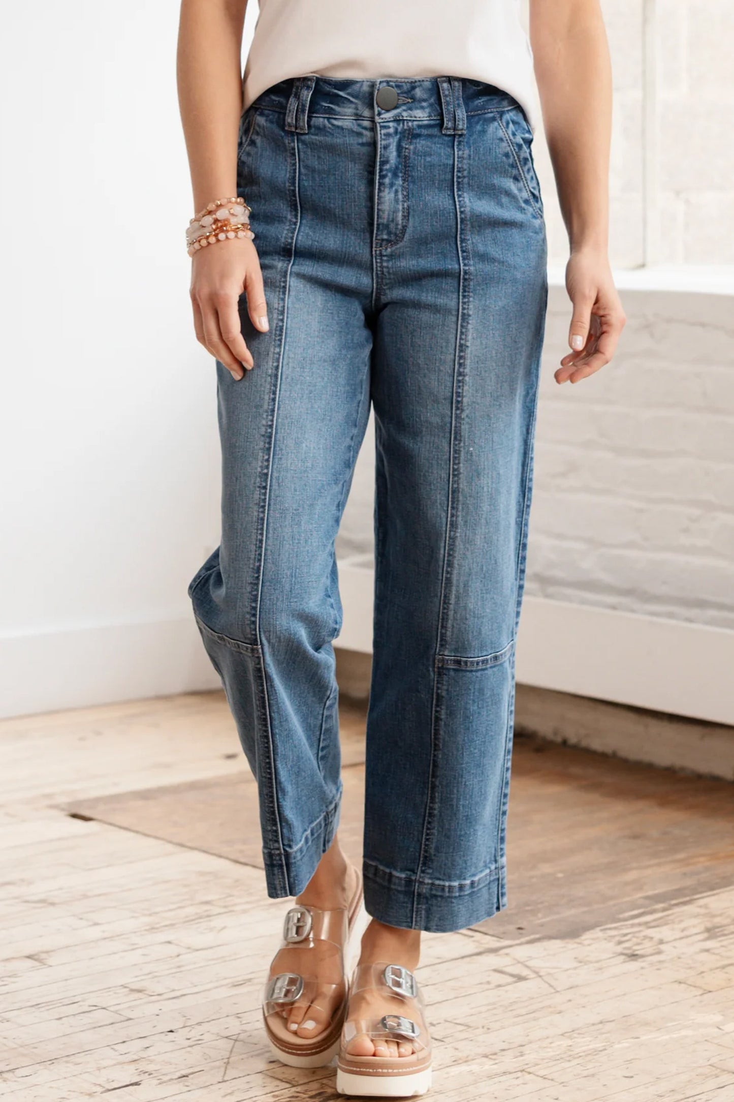 Lavendar Lane Clothing Sail Blue straight jeans with exposed stitching, featuring a classic denim look and a relaxed fit.