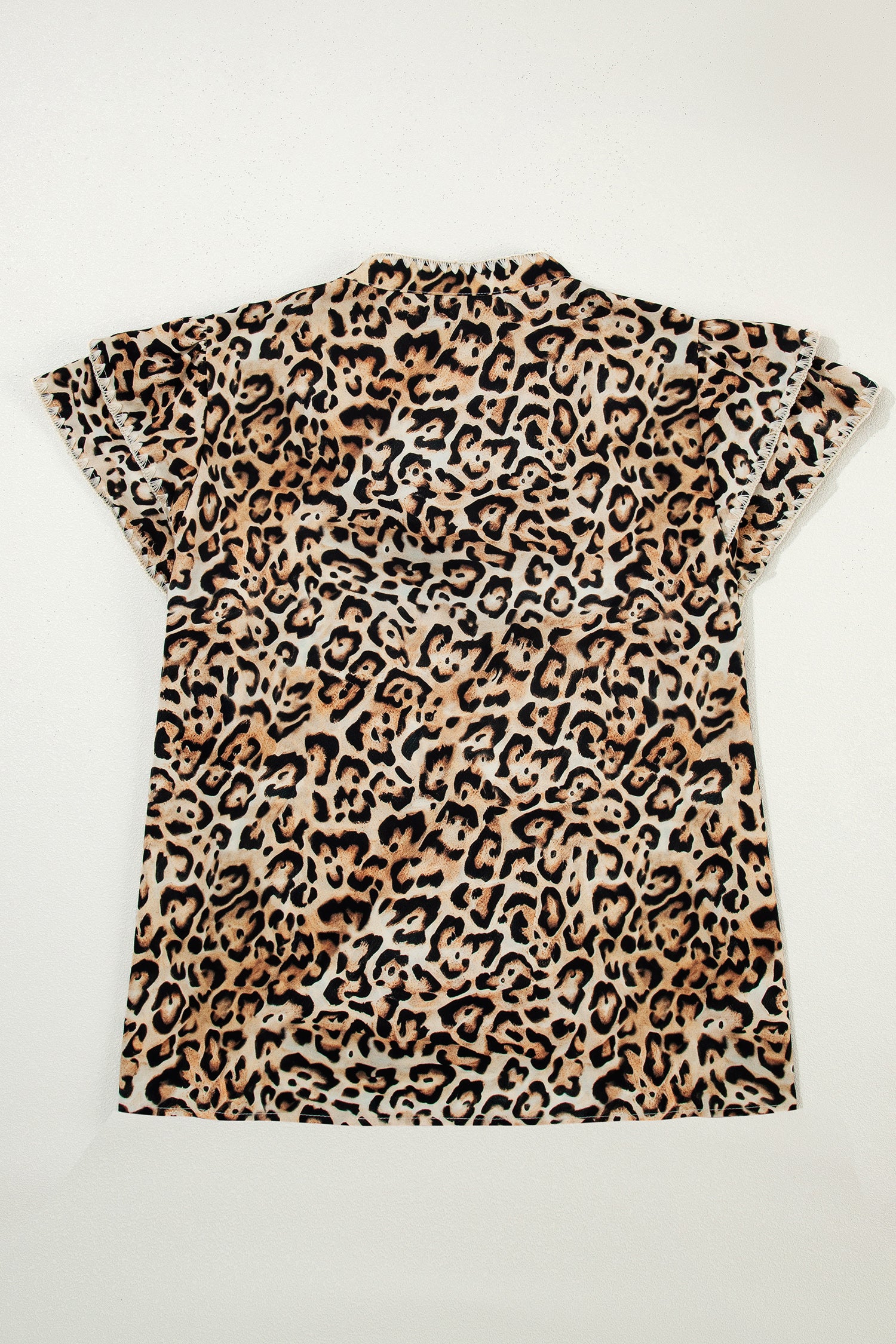 Lavendar Lane plus size khaki blouse with leopard print, ruffled short sleeves, and stitch detail, stylish and comfortable for women.