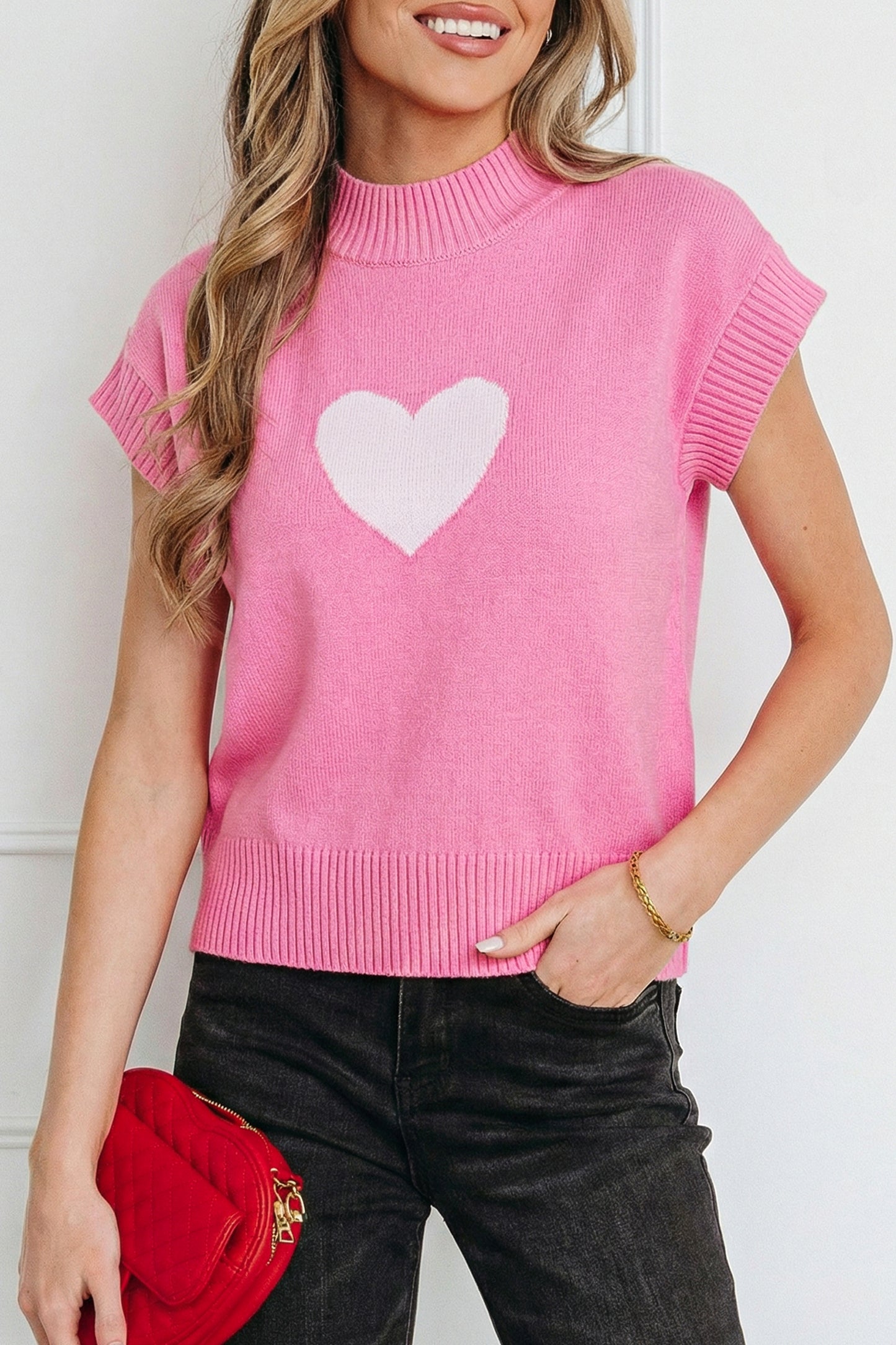 Pink Valentine heart graphic cropped short sleeve sweater by Lavender Lane Clothing, featuring a playful heart design on the front.