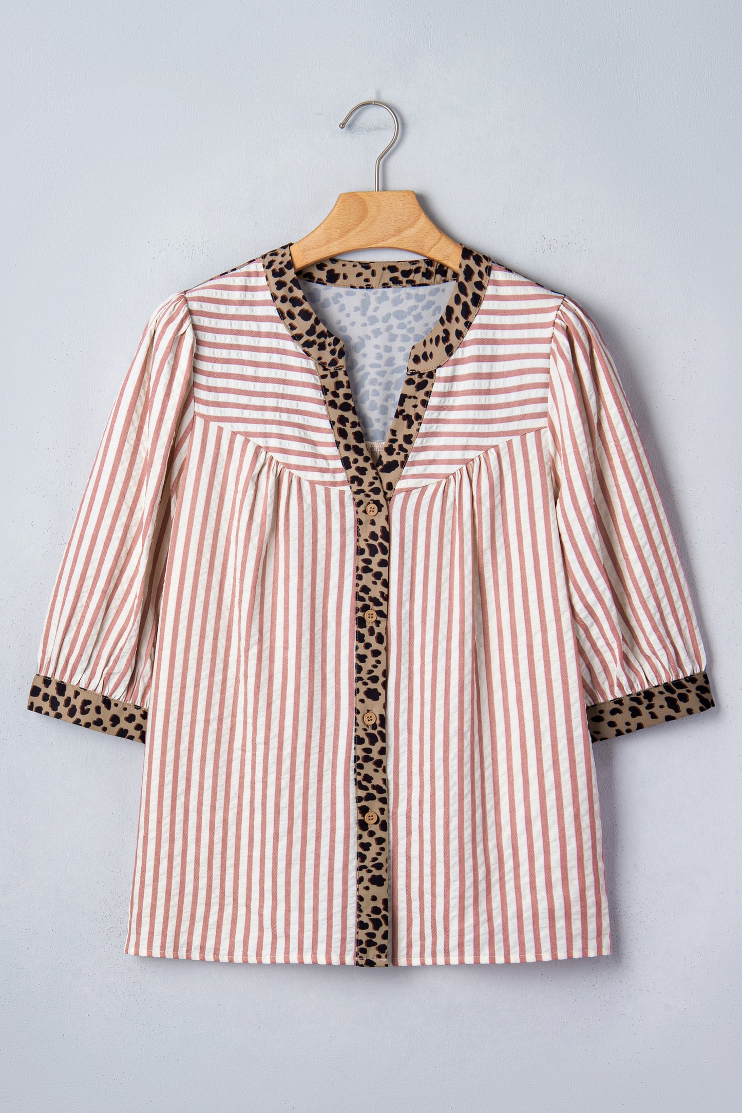 Pink stripe and leopard trim V-neck button-down blouse by Lavender Lane Clothing, featuring half sleeves and stylish design.
