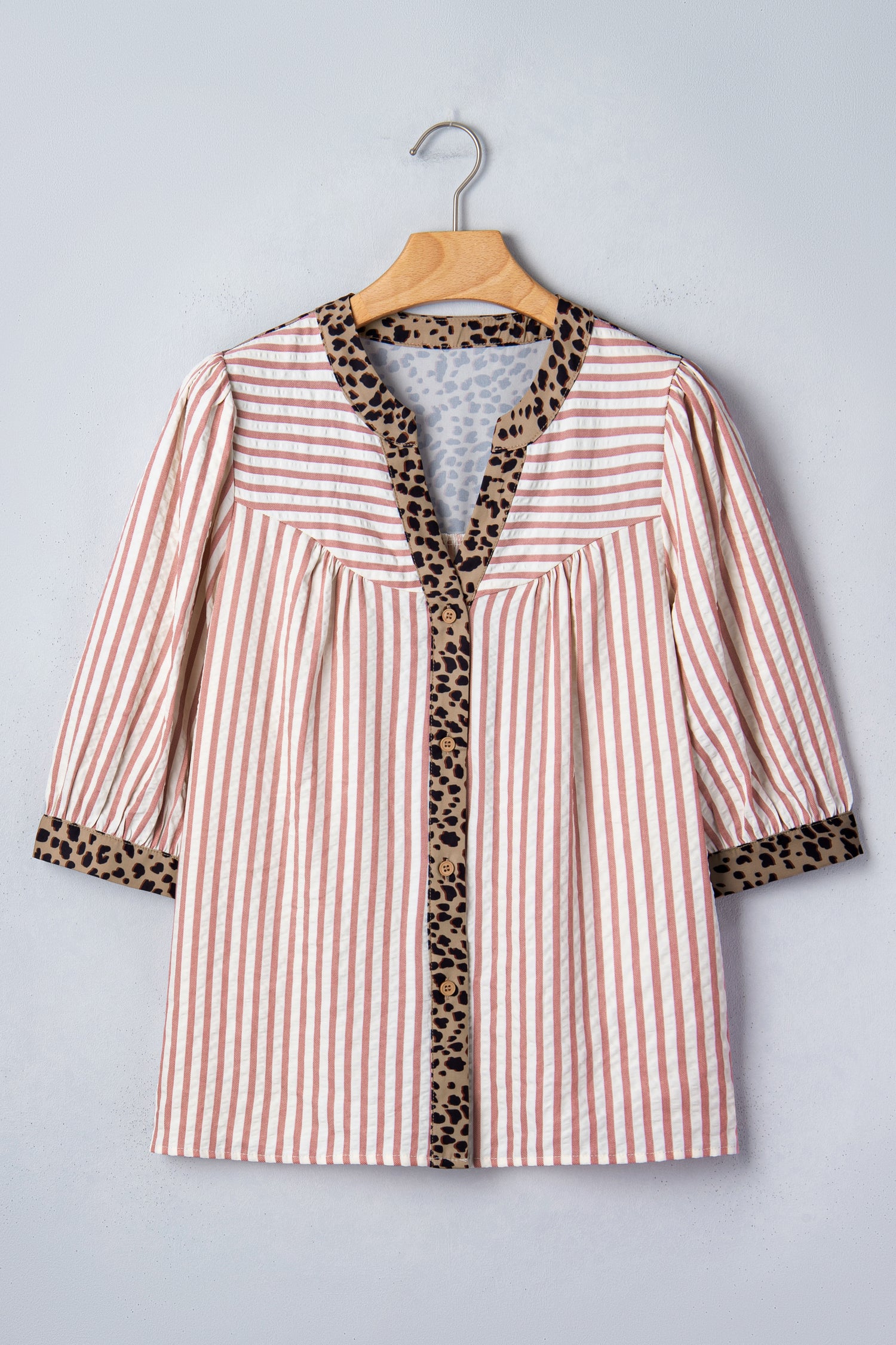 Pink stripe and leopard trim V-neck button-down blouse by Lavender Lane Clothing, featuring half sleeves and stylish design.
