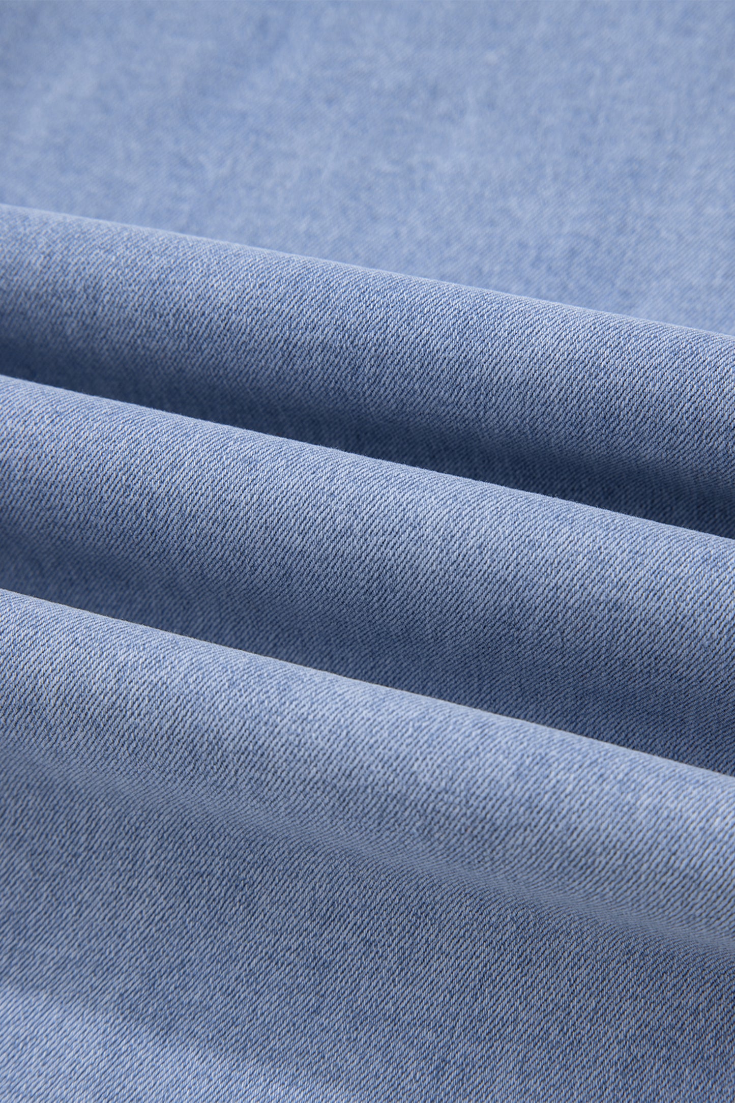 Lavendar Lane Clothing Beau Blue contrast stripe frayed side panel patchwork shift jeans showing distressed hem and stylish design.