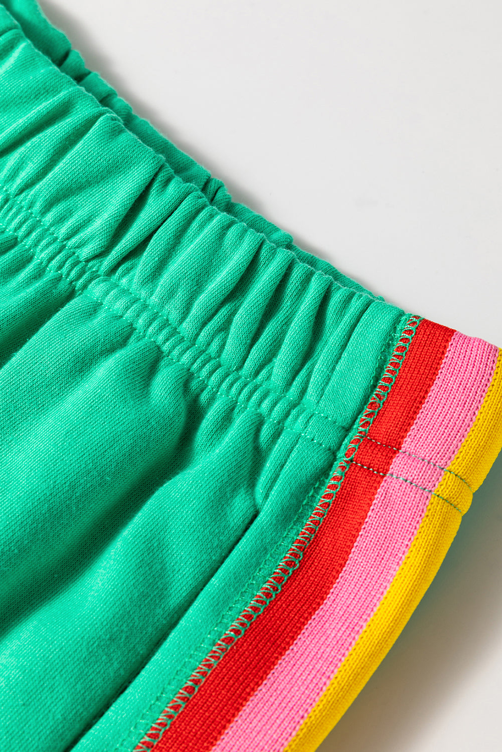 Sea green rainbow colorblock collared short sleeve top and shorts set by Lavendar Lane Clothing, casual summer two-piece outfit.