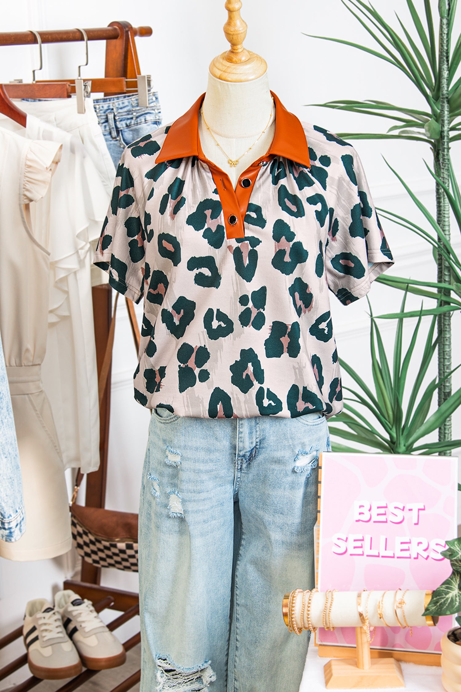 Lavendar Lane casual leopard print short sleeve blouse with contrast collar, button front, and unique design, perfect for stylish everyday wear.