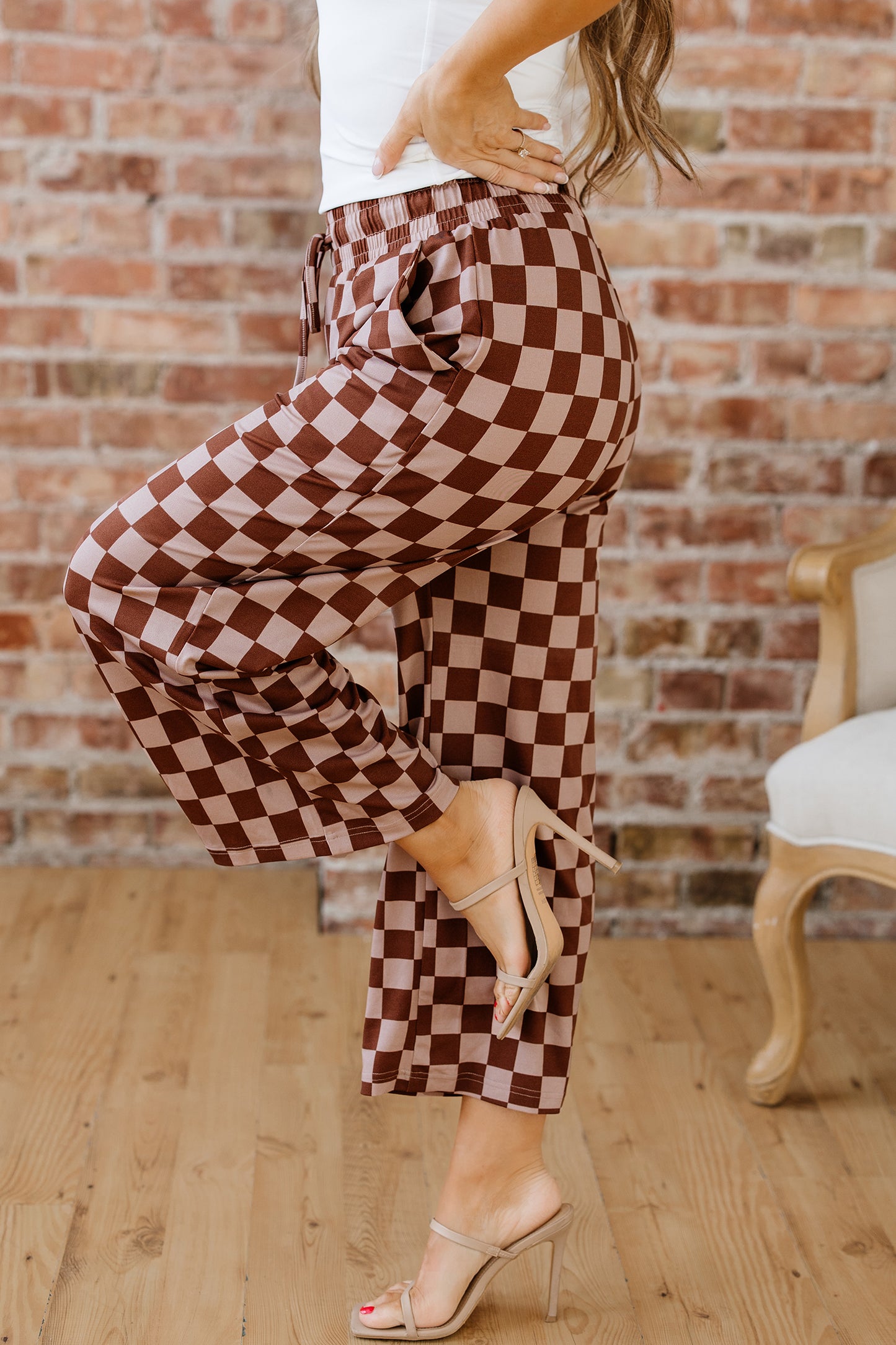 Khaki checkered elastic high waist loose casual pants by Lavendar Lane Clothing, showcasing relaxed fit and stylish pattern.