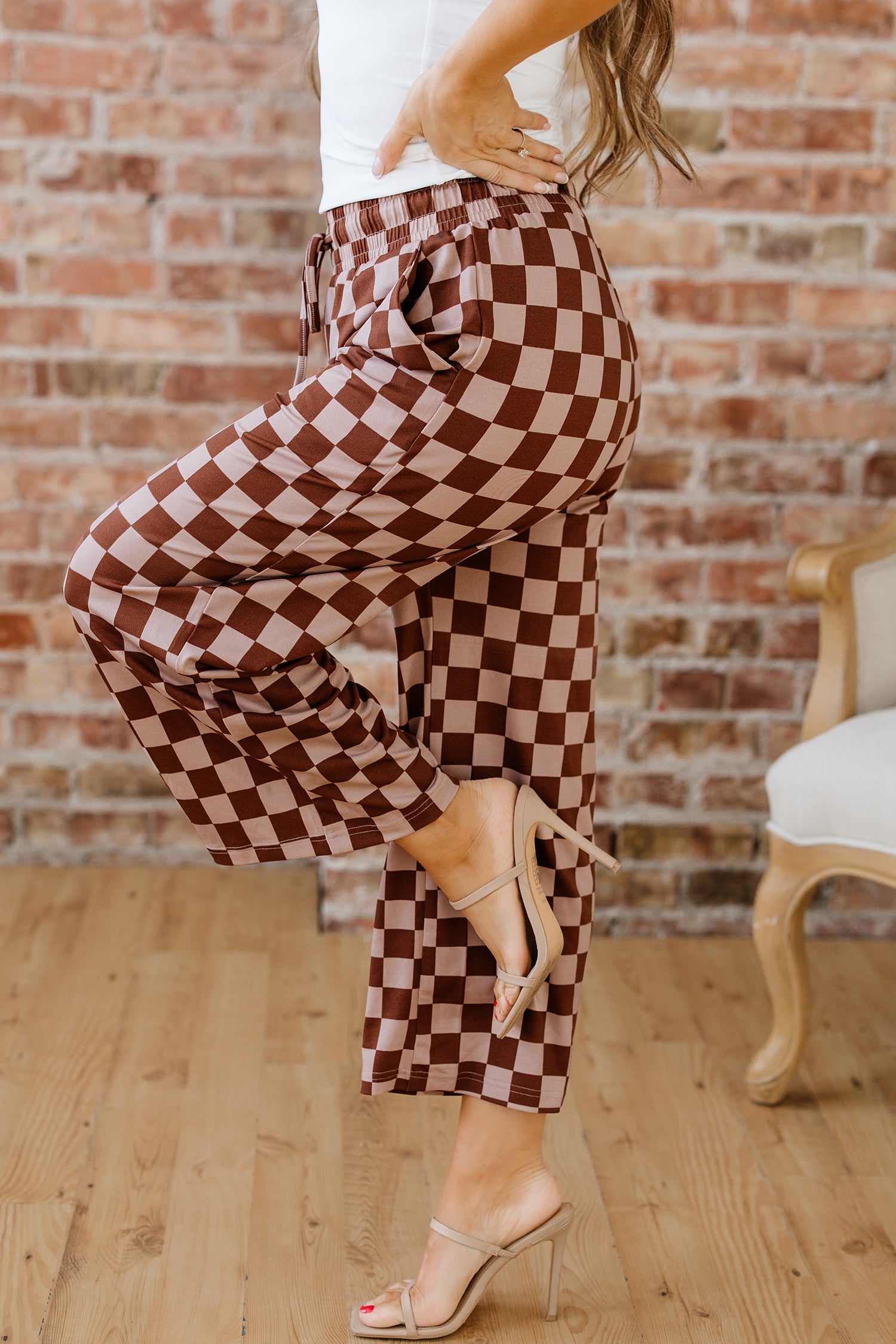 Khaki checkered elastic high waist loose casual pants by Lavendar Lane Clothing, showcasing relaxed fit and stylish pattern.