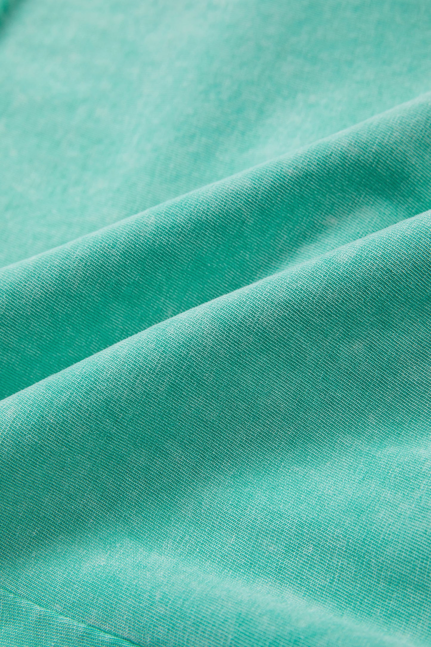 Sea green mineral washed drawstring casual shorts with elastic waist and raw cut hem from Lavendar Lane Clothing.