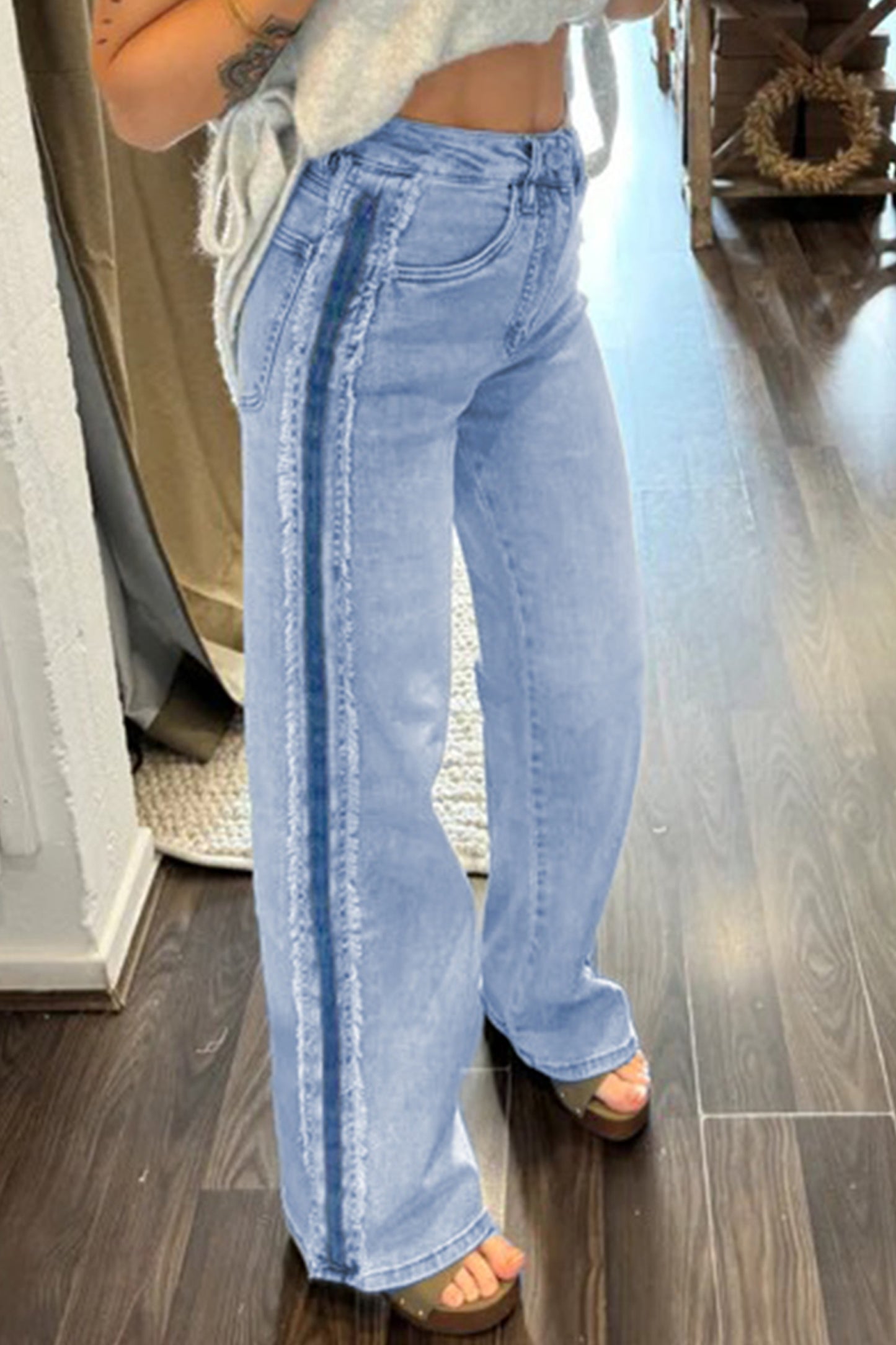 Lavendar Lane Clothing Beau Blue contrast stripe frayed side panel patchwork shift jeans, showcasing distressed denim with colorful accents.
