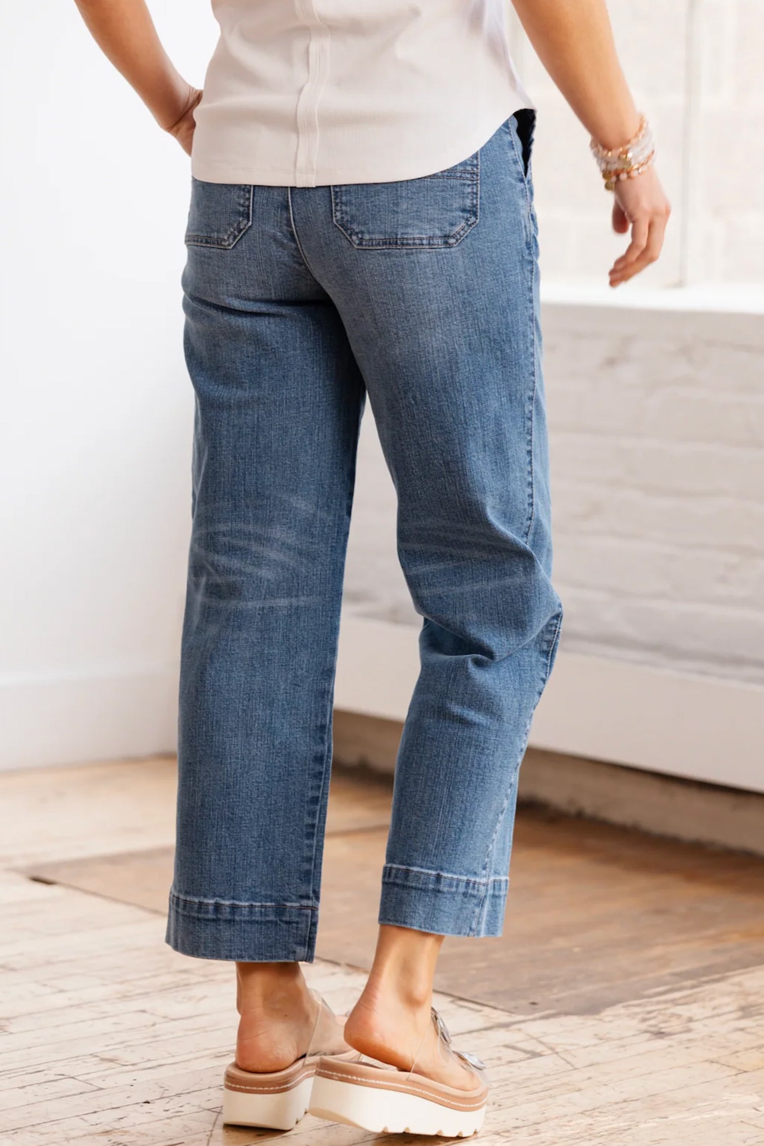 Lavendar Lane Clothing Sail Blue straight jeans with exposed stitching, classic denim bottoms, casual fit, on a plain background.