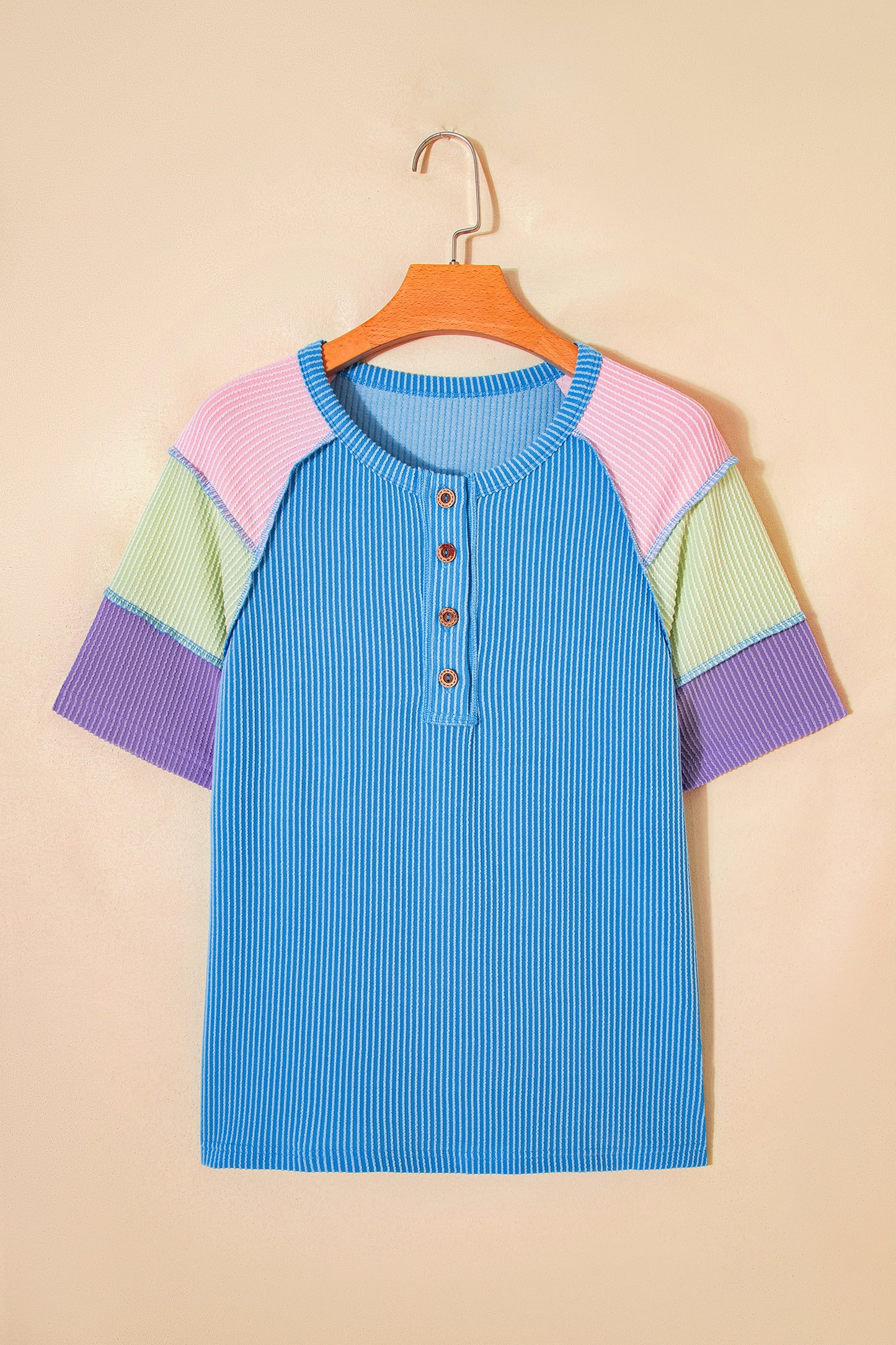 Blue twisted ribbed color block patchwork Henley blouse from Lavendar Lane Clothing, short sleeve with button placket.