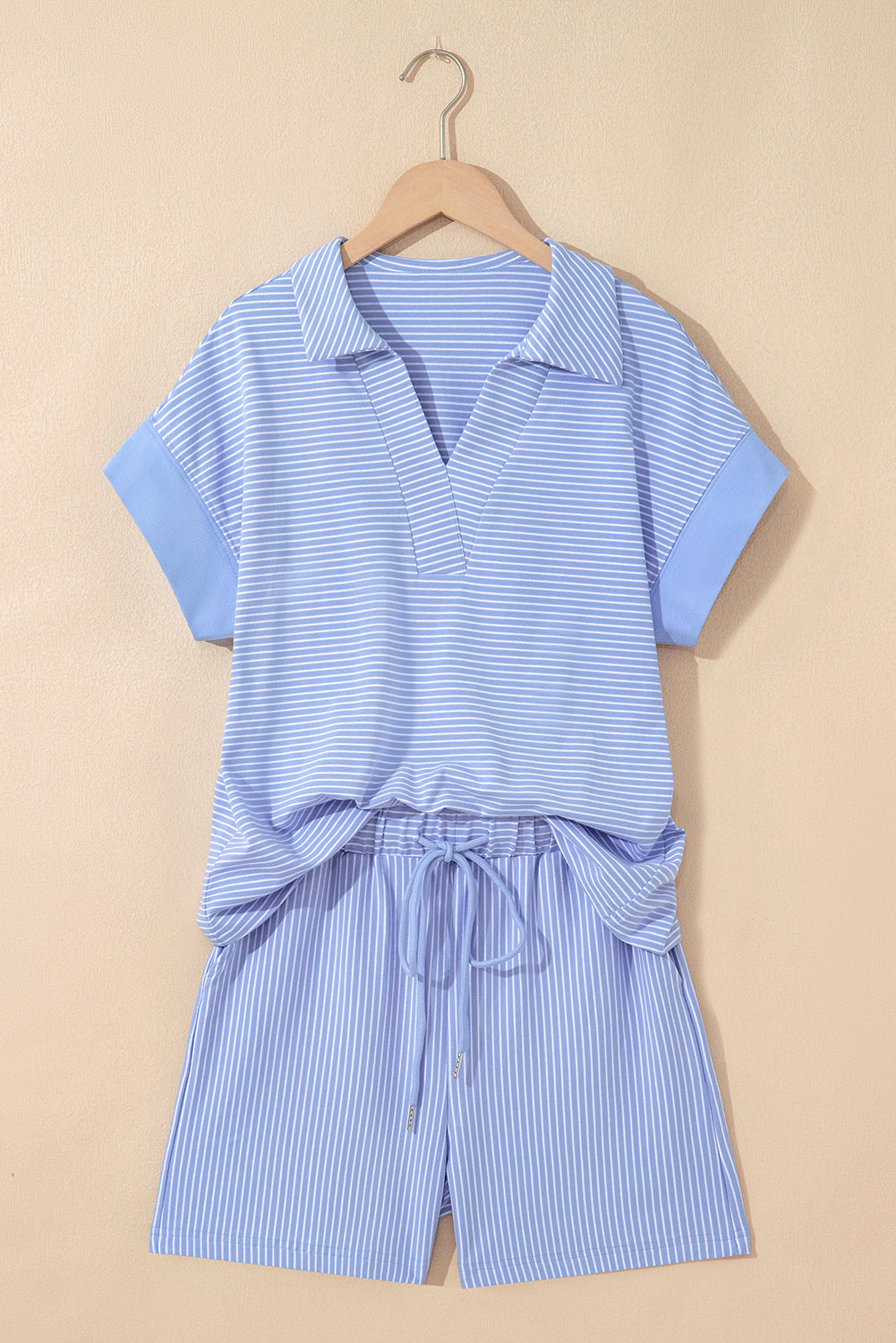 Lavender Lane Clothing sky blue stripe dolman sleeve polo shirt and drawstring shorts set for women, casual two-piece summer outfit.