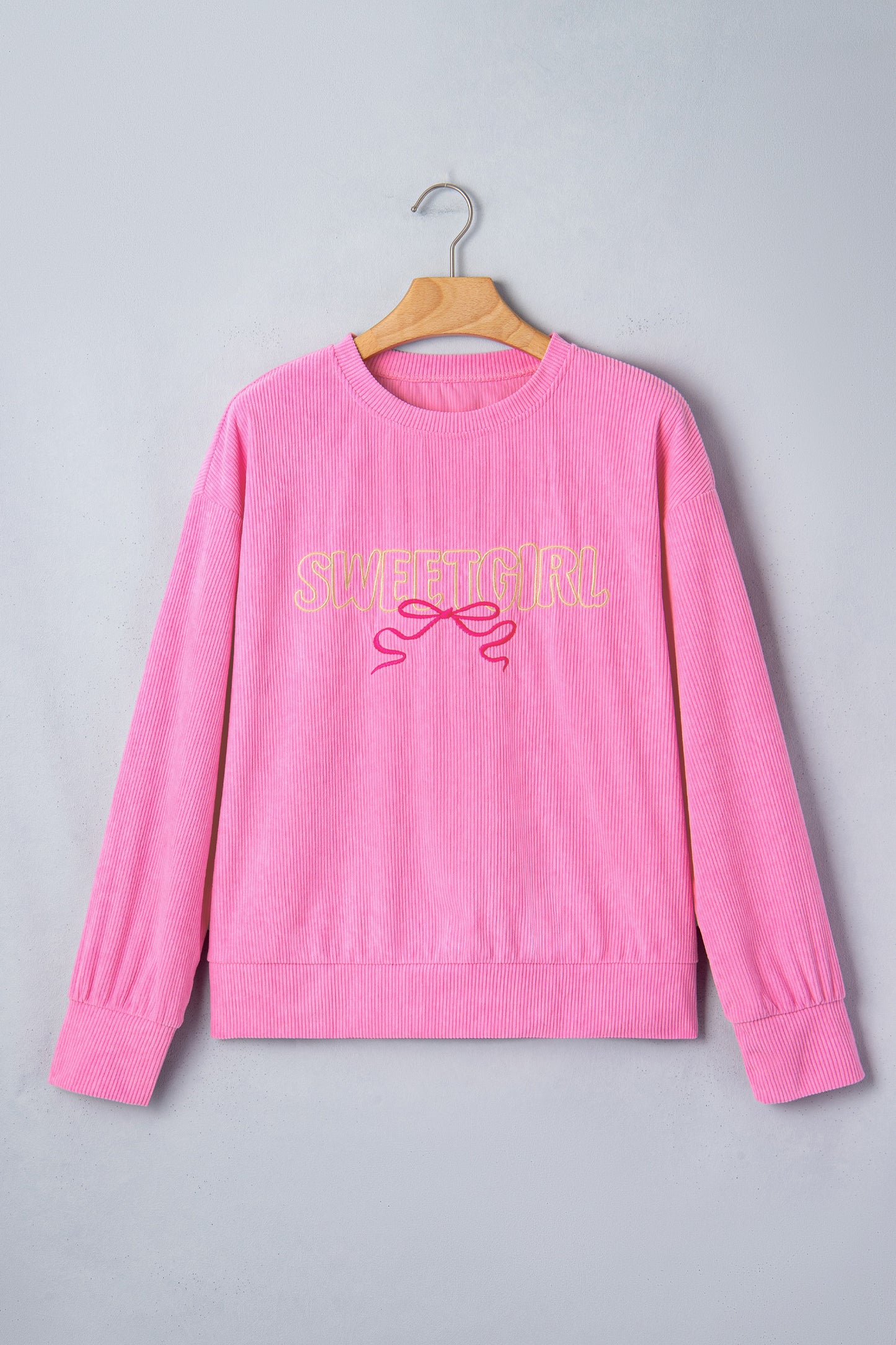 Lavendar Lane Clothing Bonbon Sweet Girl embroidered graphic rib textured top in soft pastel colors.