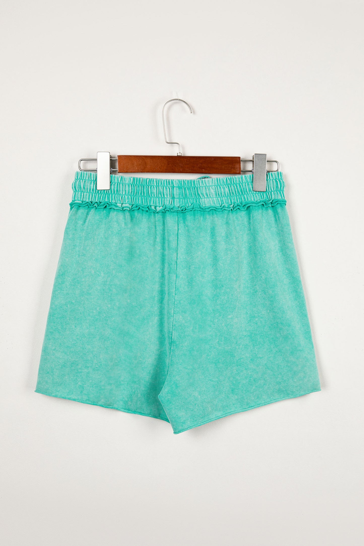 Sea green mineral washed drawstring casual shorts with elastic waist and raw cut hem from Lavendar Lane Clothing