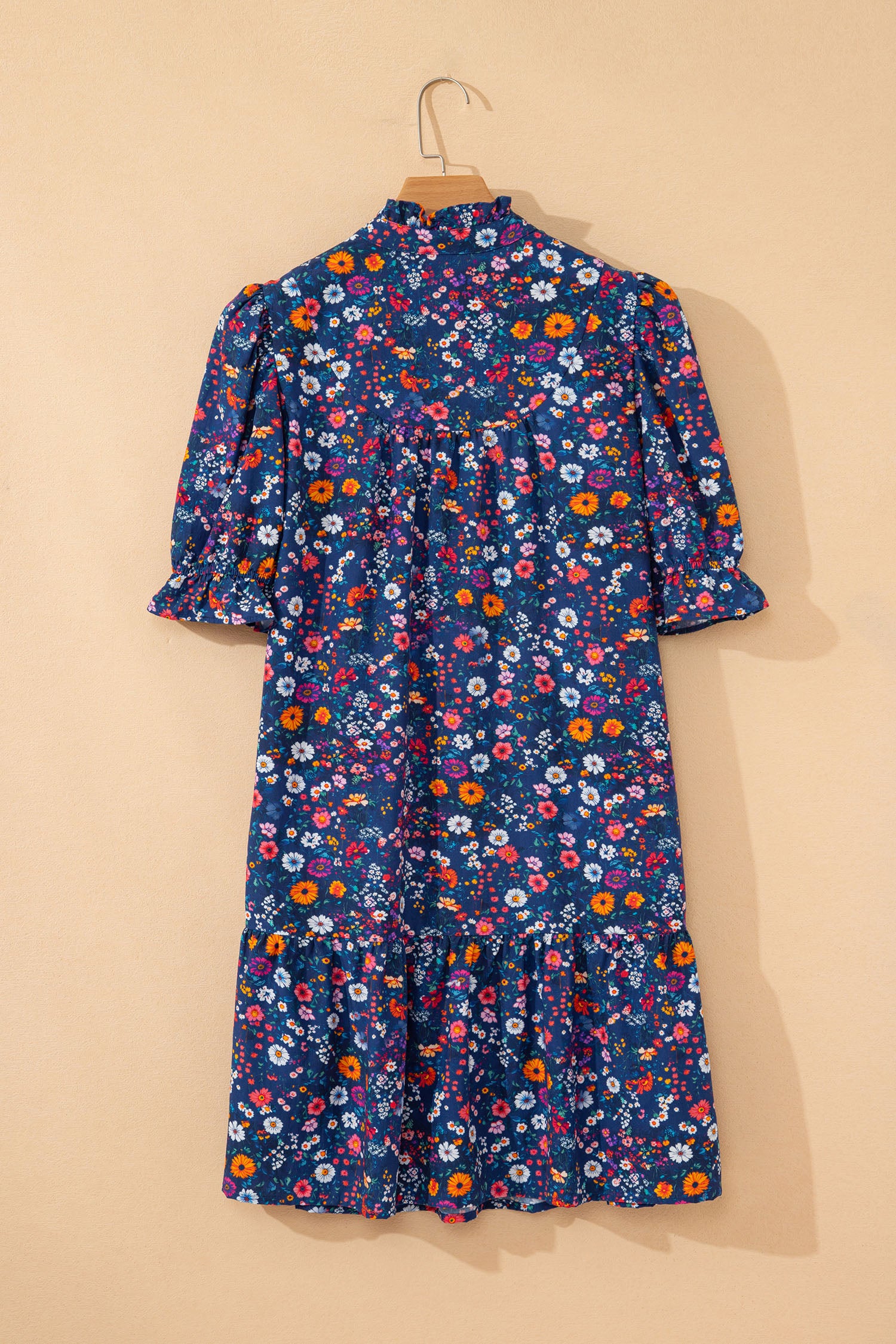 Blue Wild Daisy floral mini dress with split neckline and short puff sleeves by Lavendar Lane Clothing, perfect for summer wear.