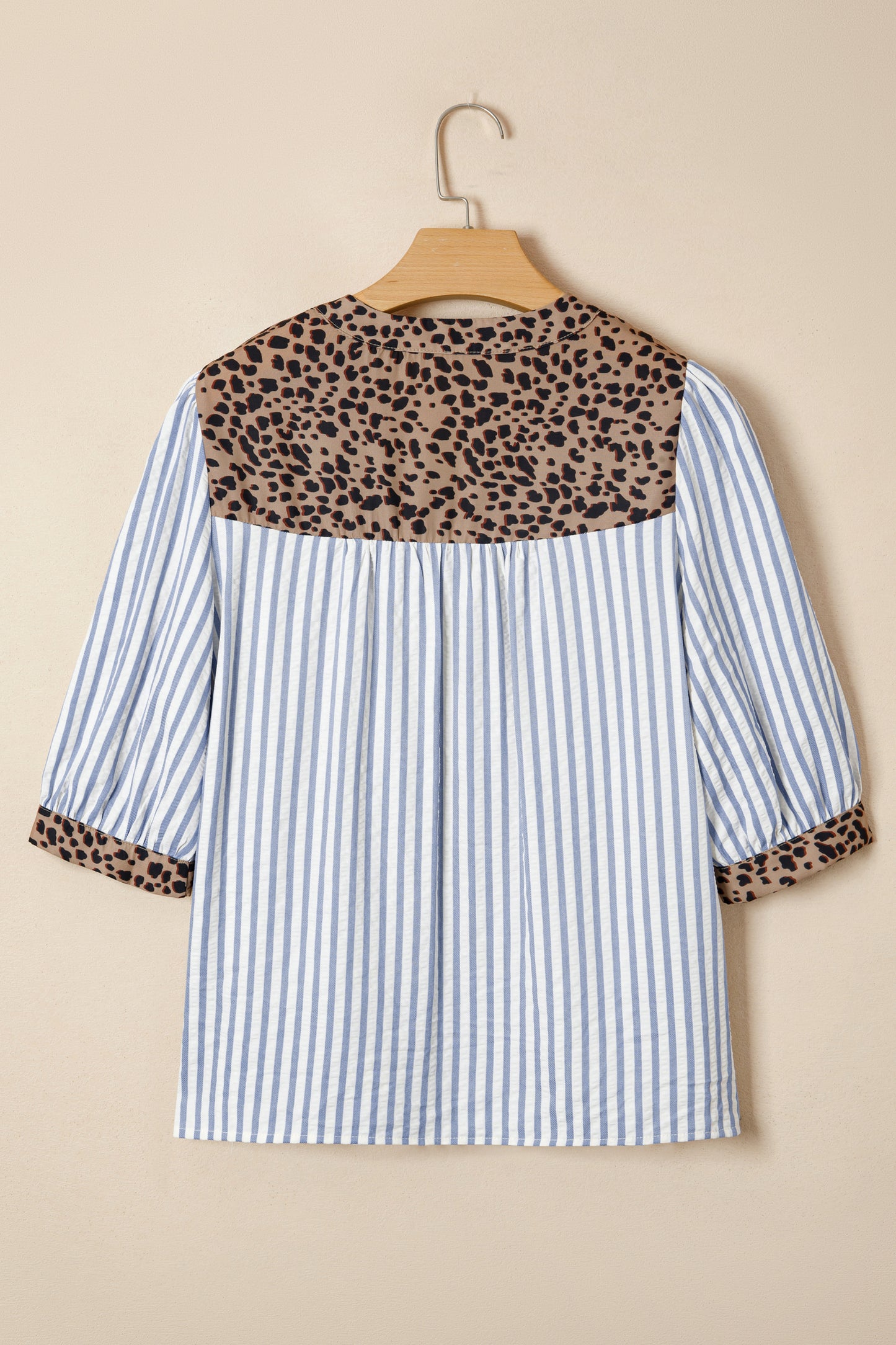 Sky blue striped blouse with leopard trim, V-neck, button-down, short sleeves, from Lavender Lane Clothing.